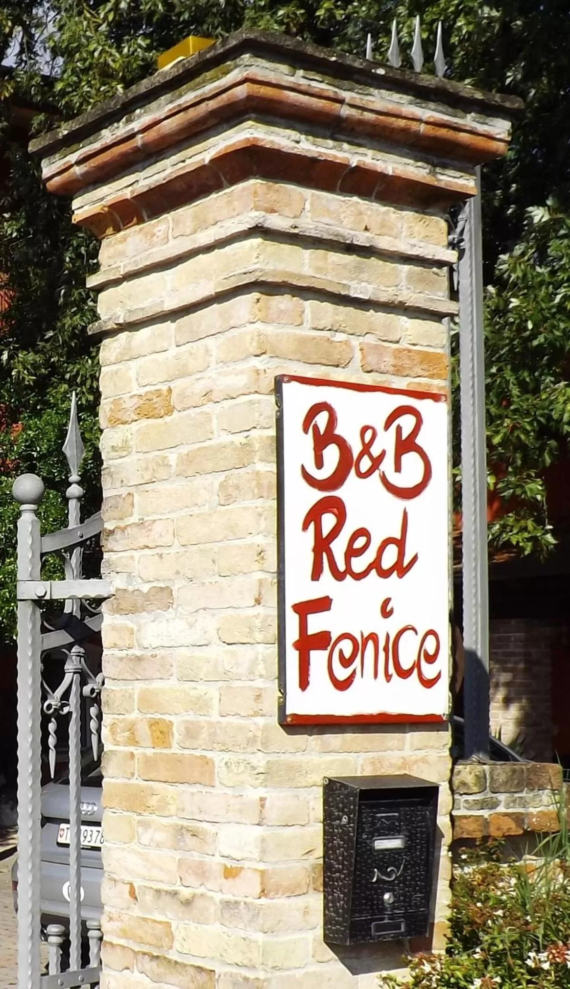 Day, Property Logo/Sign in Red Fenice