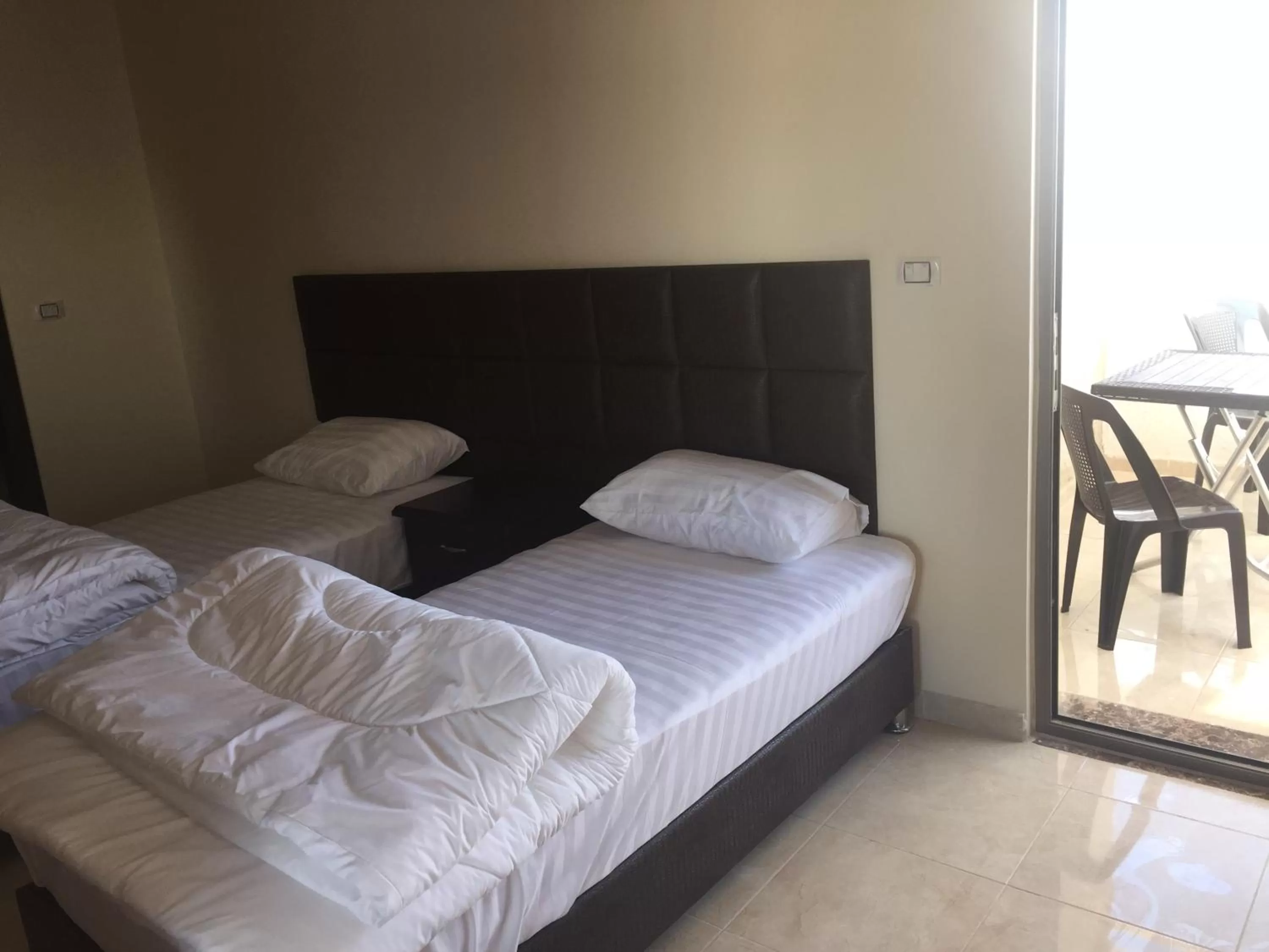 Bed in Al haramain Furnished Apartments