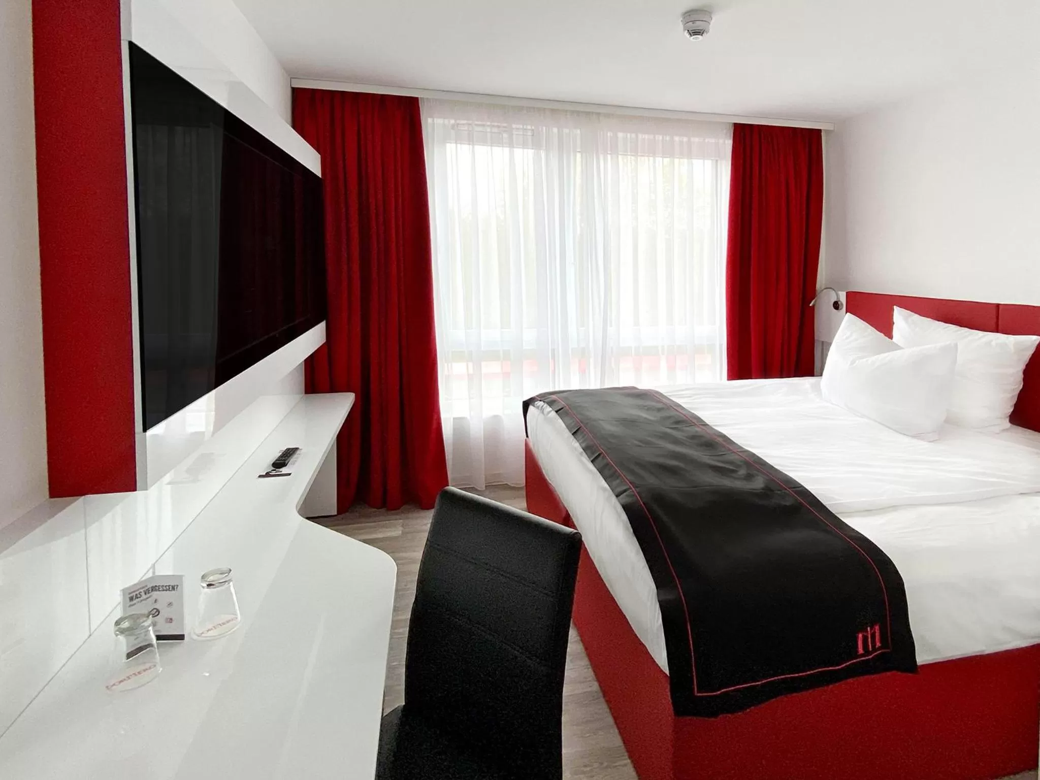Photo of the whole room, Bed in DORMERO Hotel Darmstadt