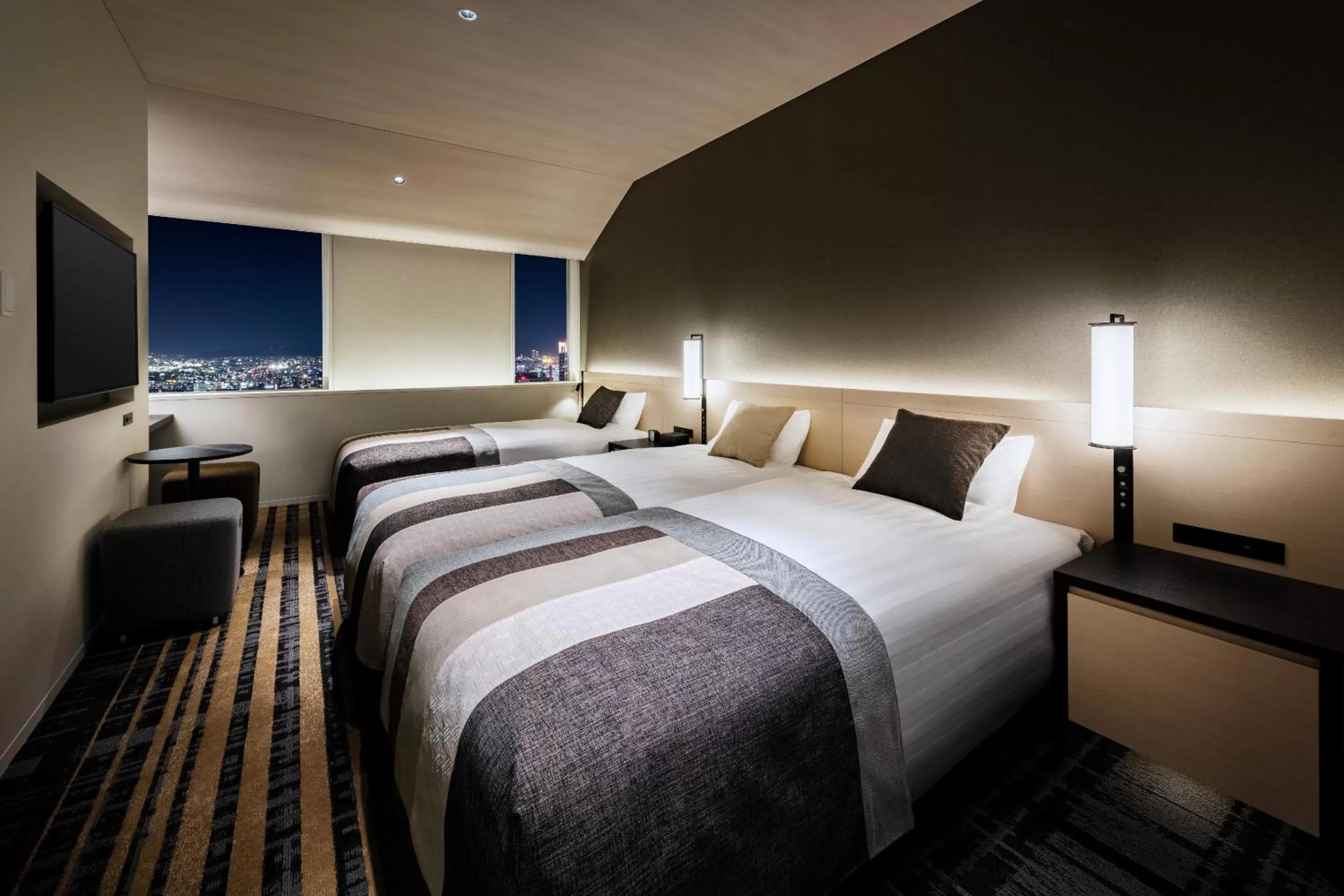 Bed in Hotel Hankyu RESPIRE OSAKA