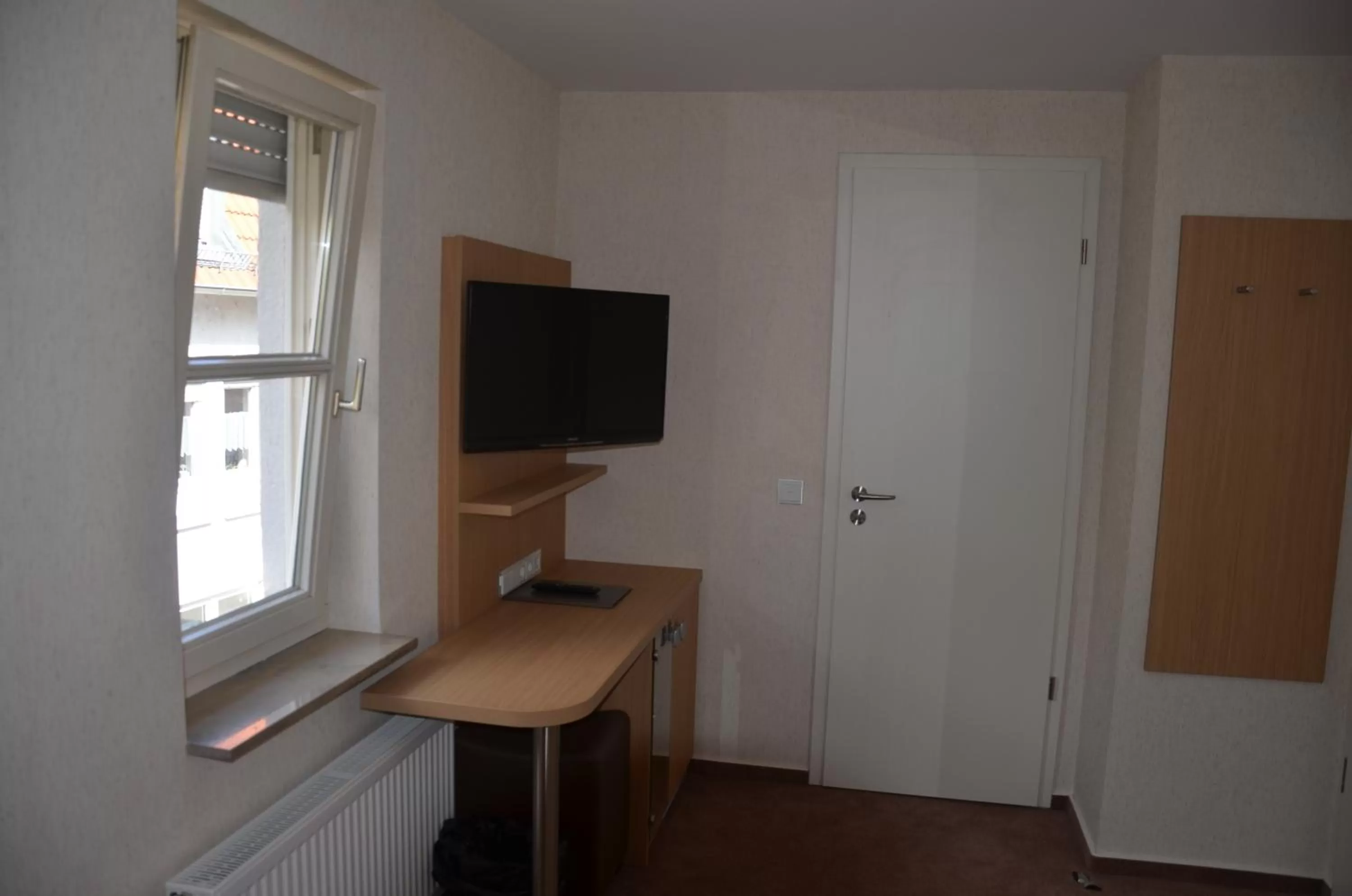 TV and multimedia, TV/Entertainment Center in Hotel Ortel