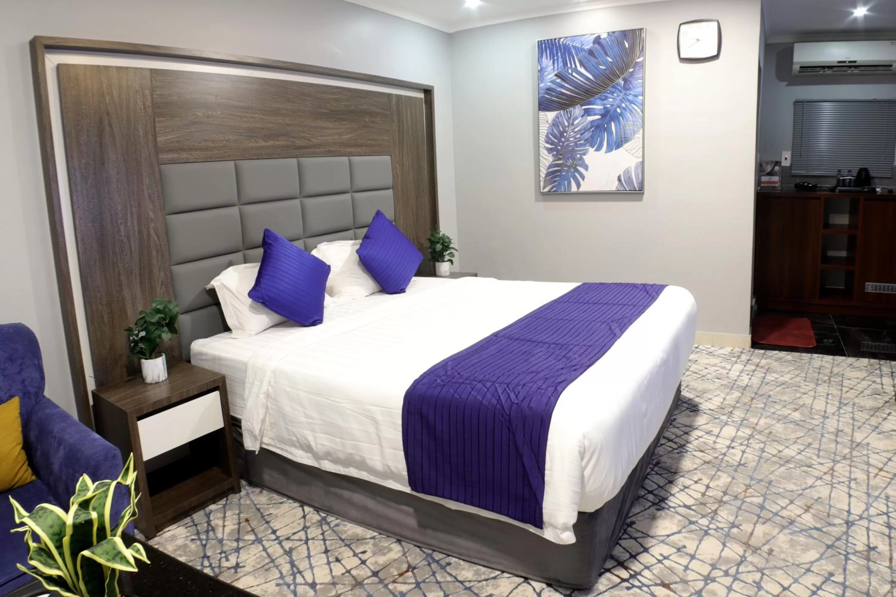 Bed in Maskan Al Dyafah Hotel Apartments