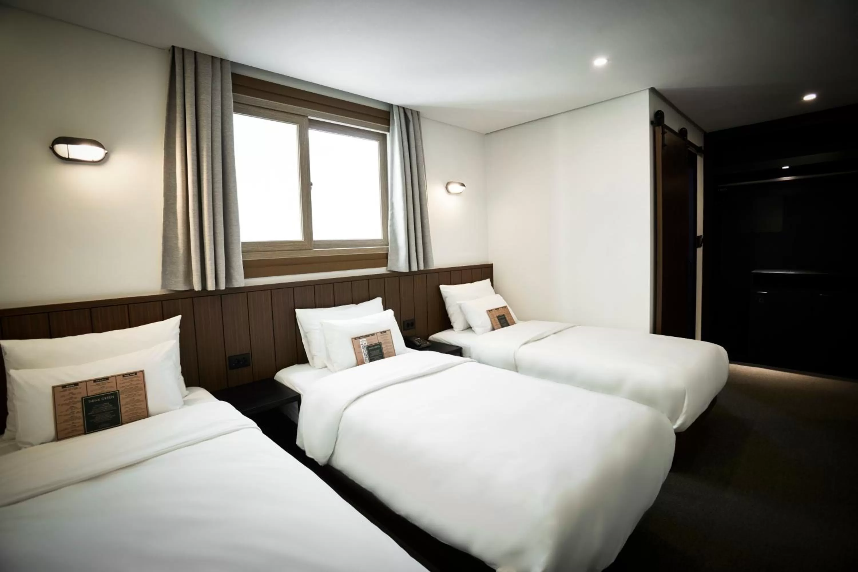 Bed in Hotel Lumia Myeongdong
