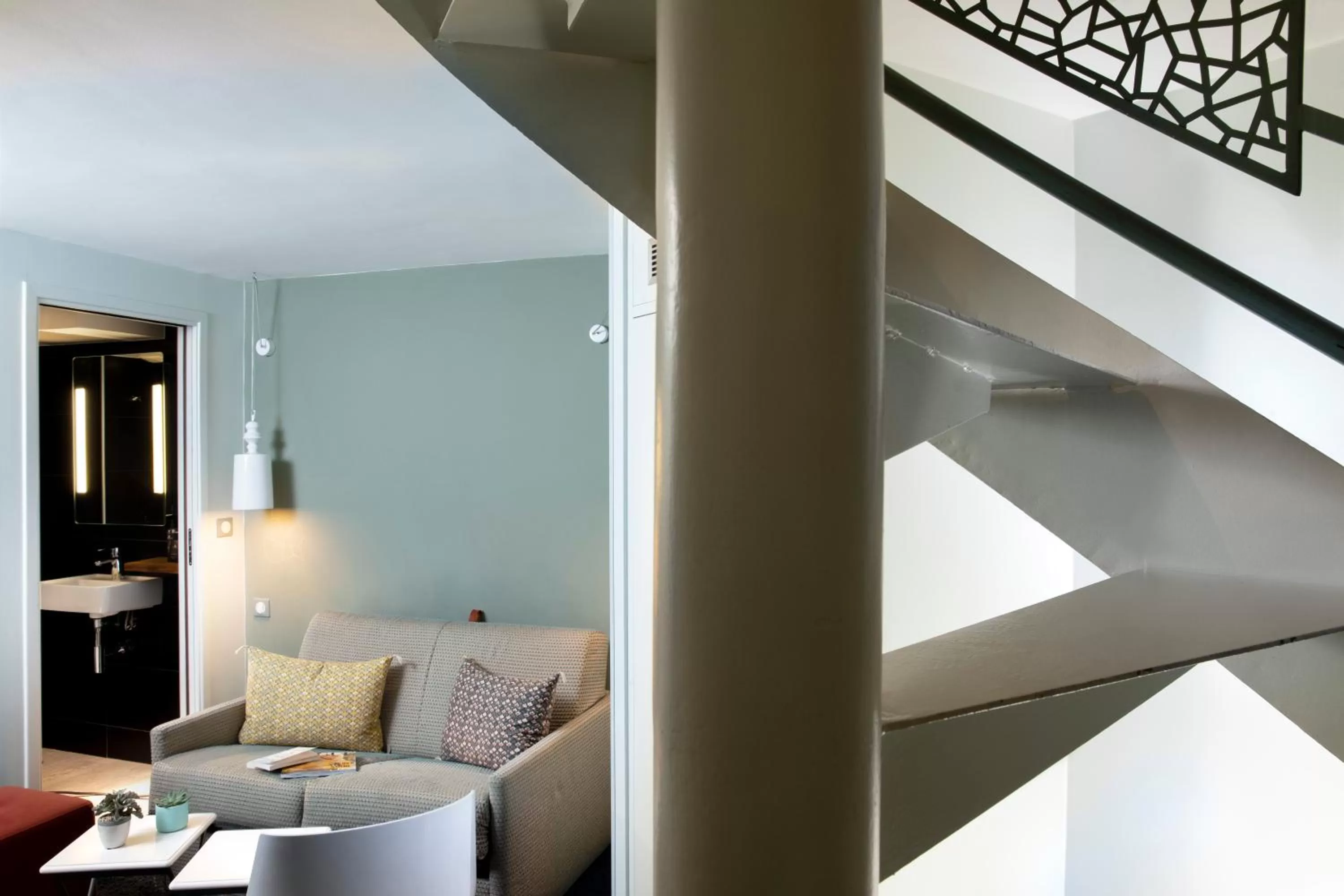 Bathroom in Hôtel Marais Hôme