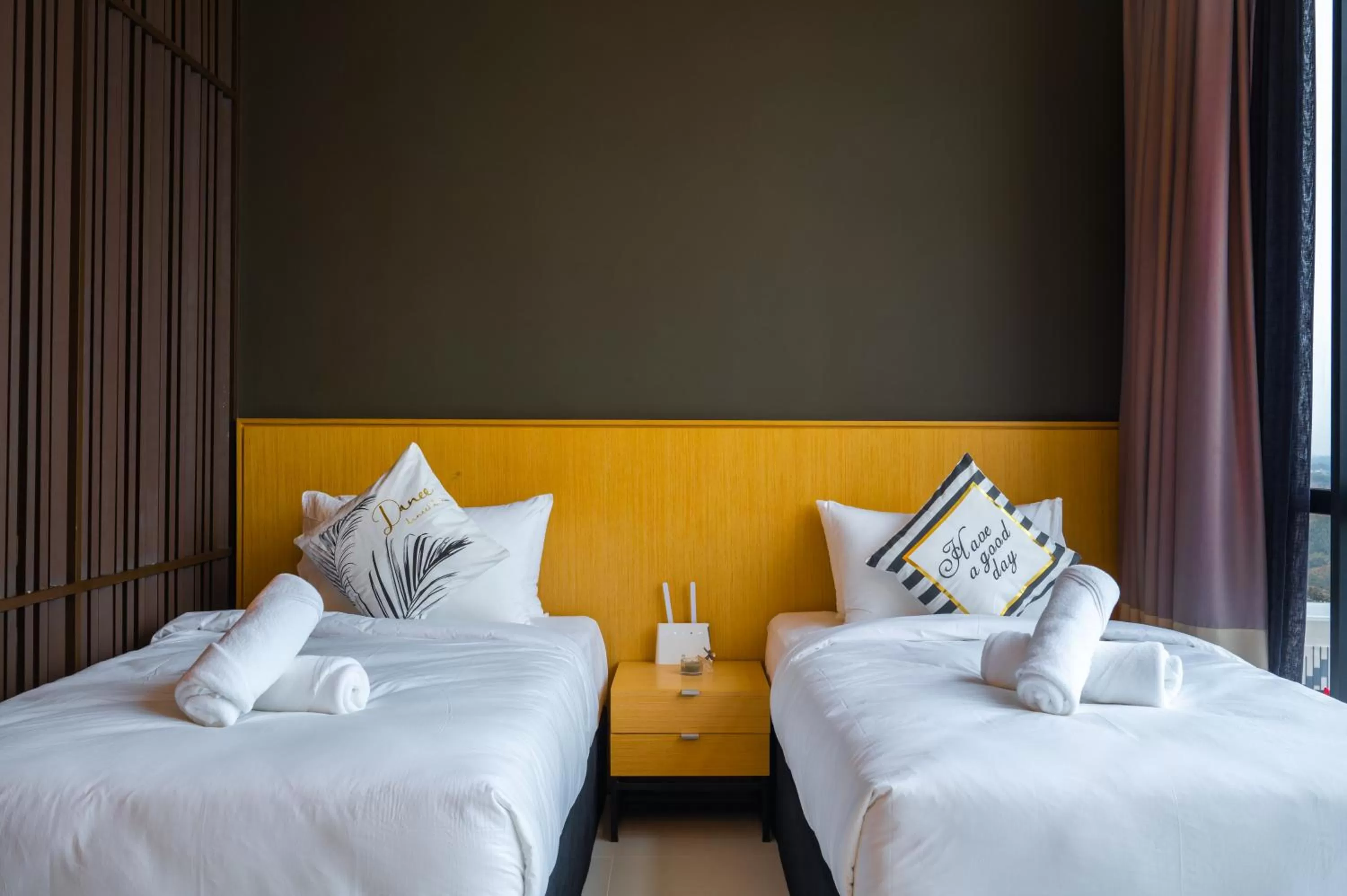 Bed in Greystone 99 Suites