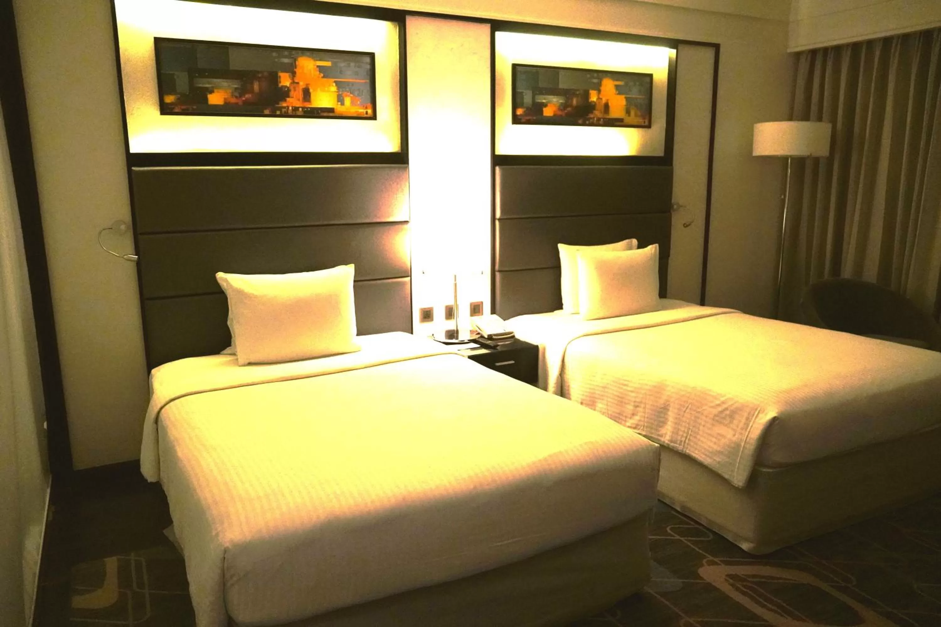 Photo of the whole room, Bed in Crowne Plaza Pune City Centre by IHG