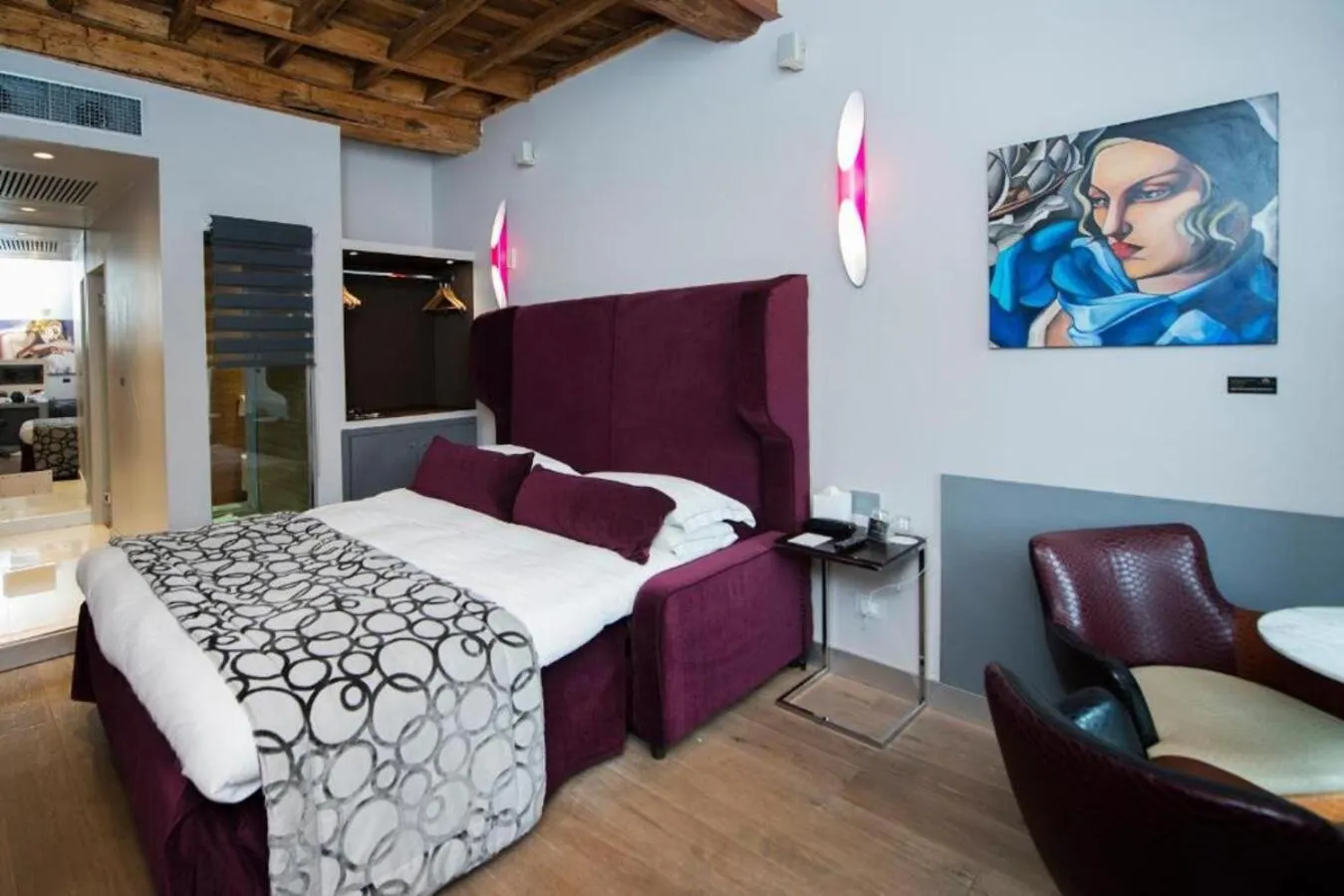 Bed in Torre Argentina Relais - Residenze di Charme