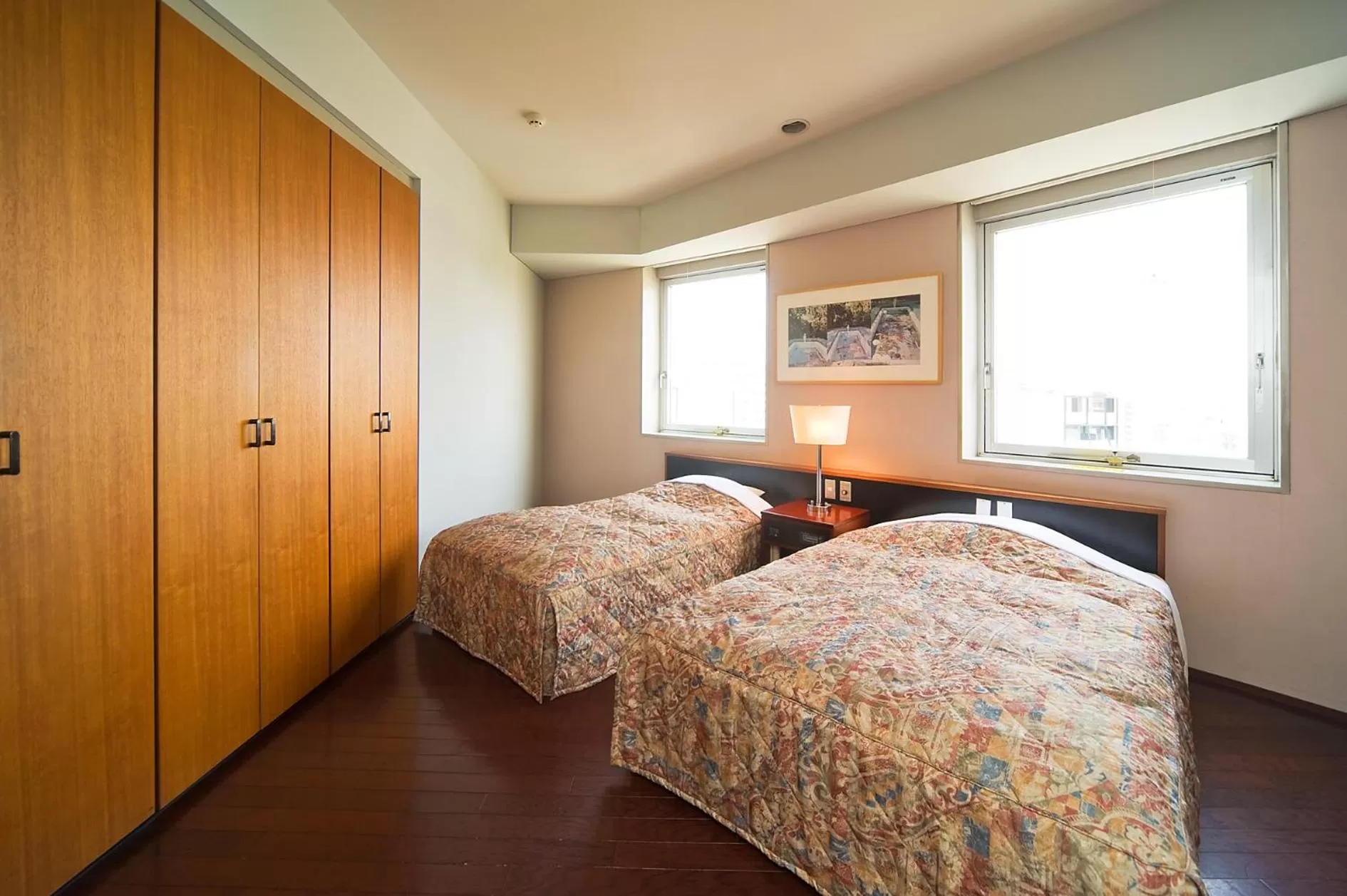 Bedroom, Bed in The Residential Suites Fukuoka