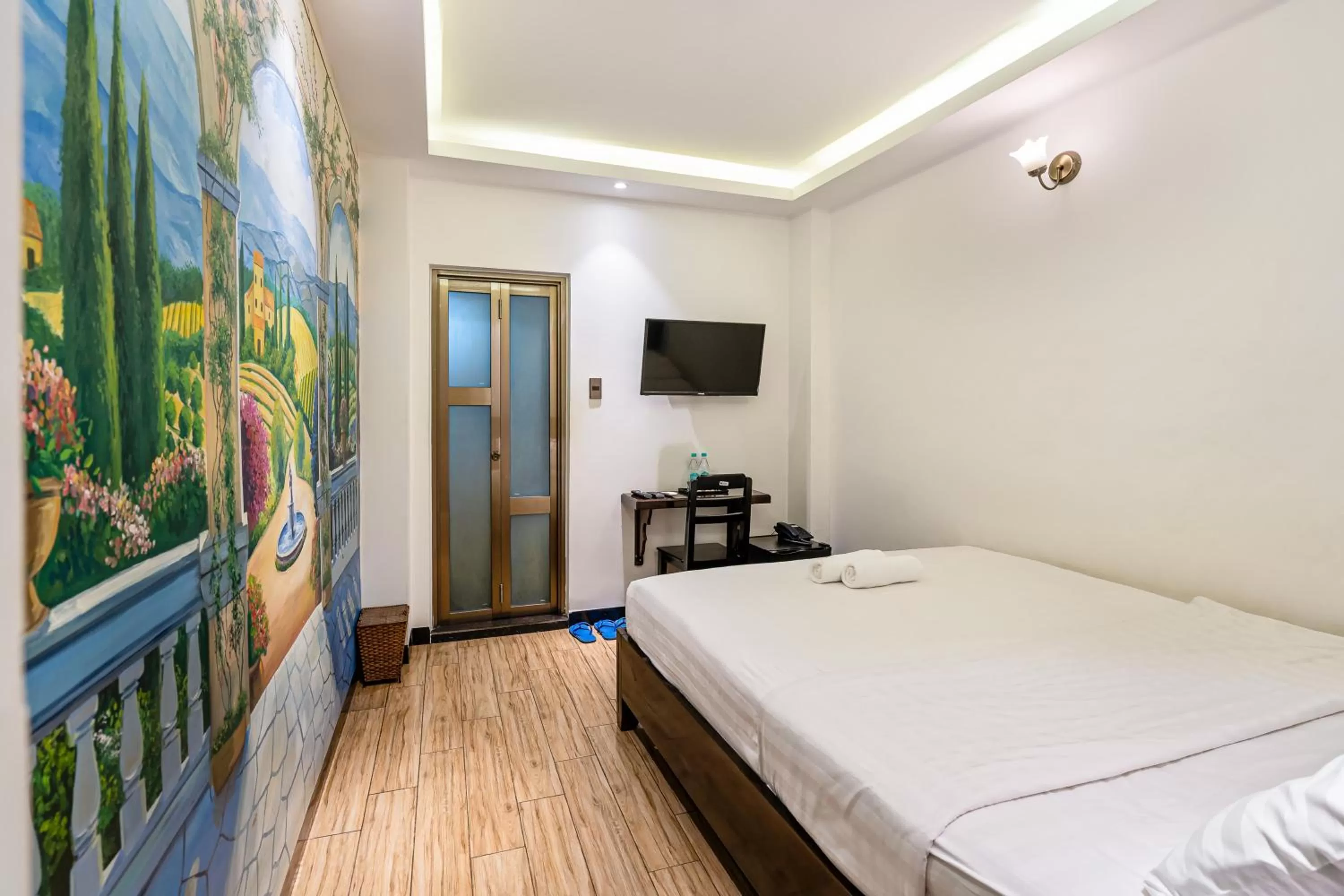 Bed in Lotus Laverne Hotel