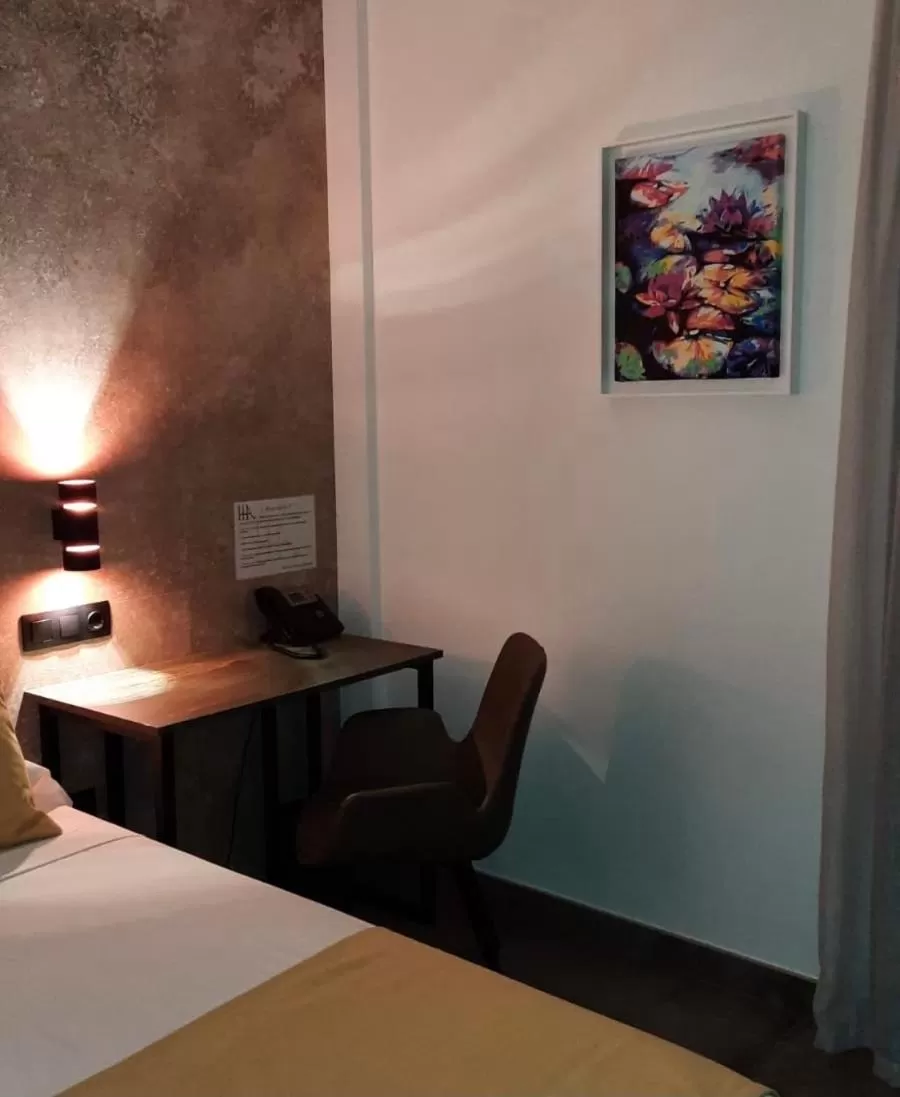 Seating area, Bed in HOTEL Boutique ÁNGEL