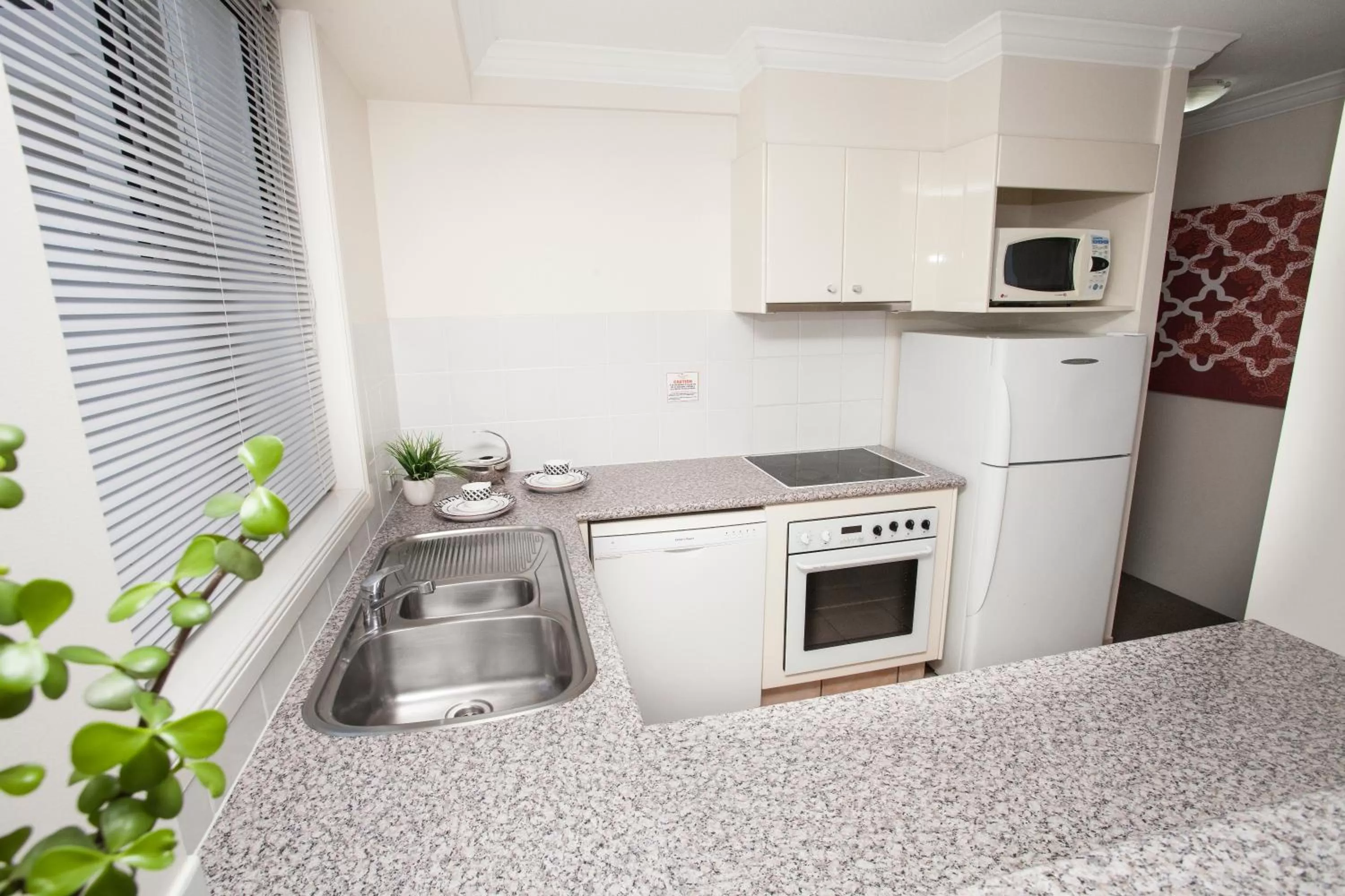 Kitchen or kitchenette in Marrakesh Apartments