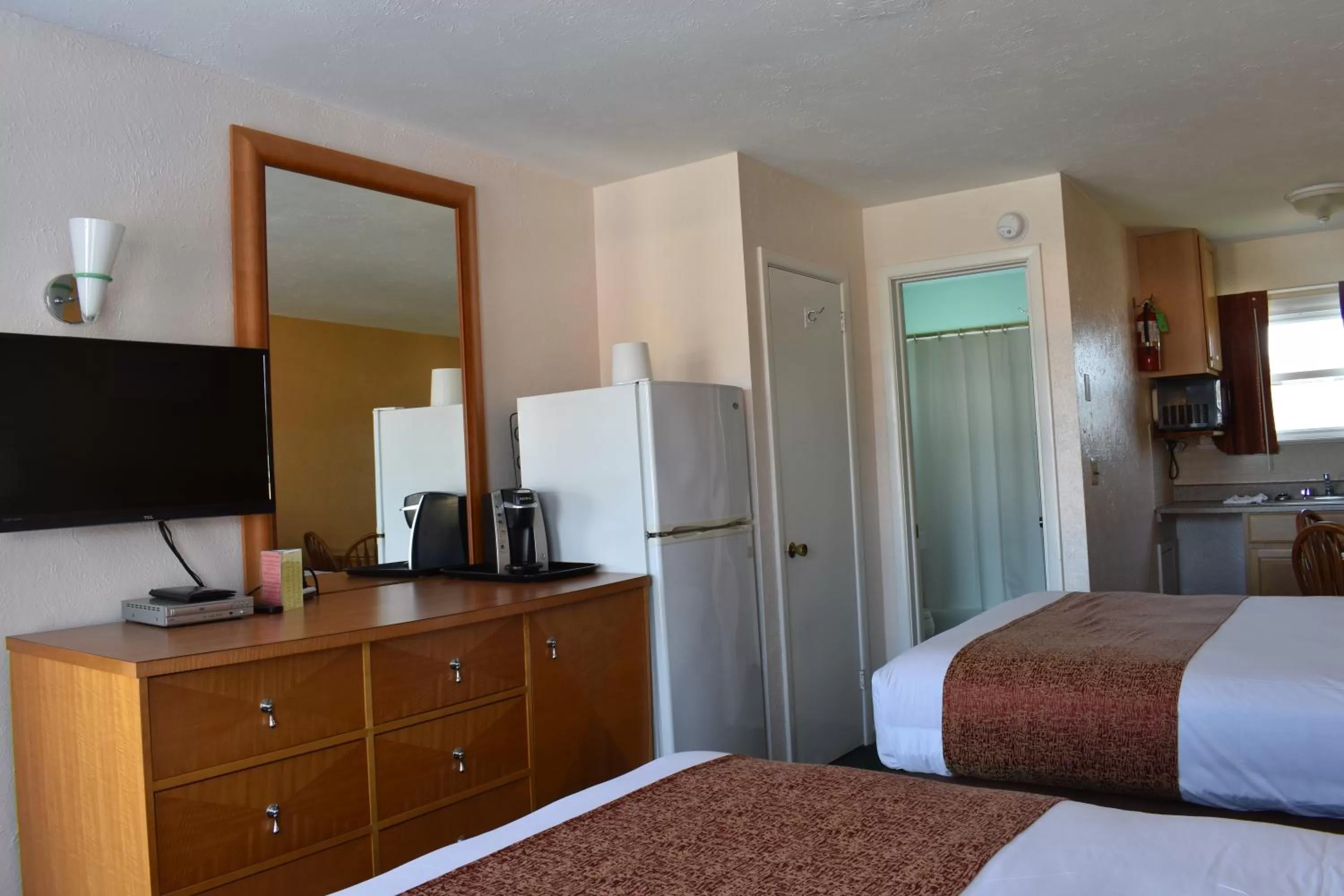 Bed in Blue Water Motel