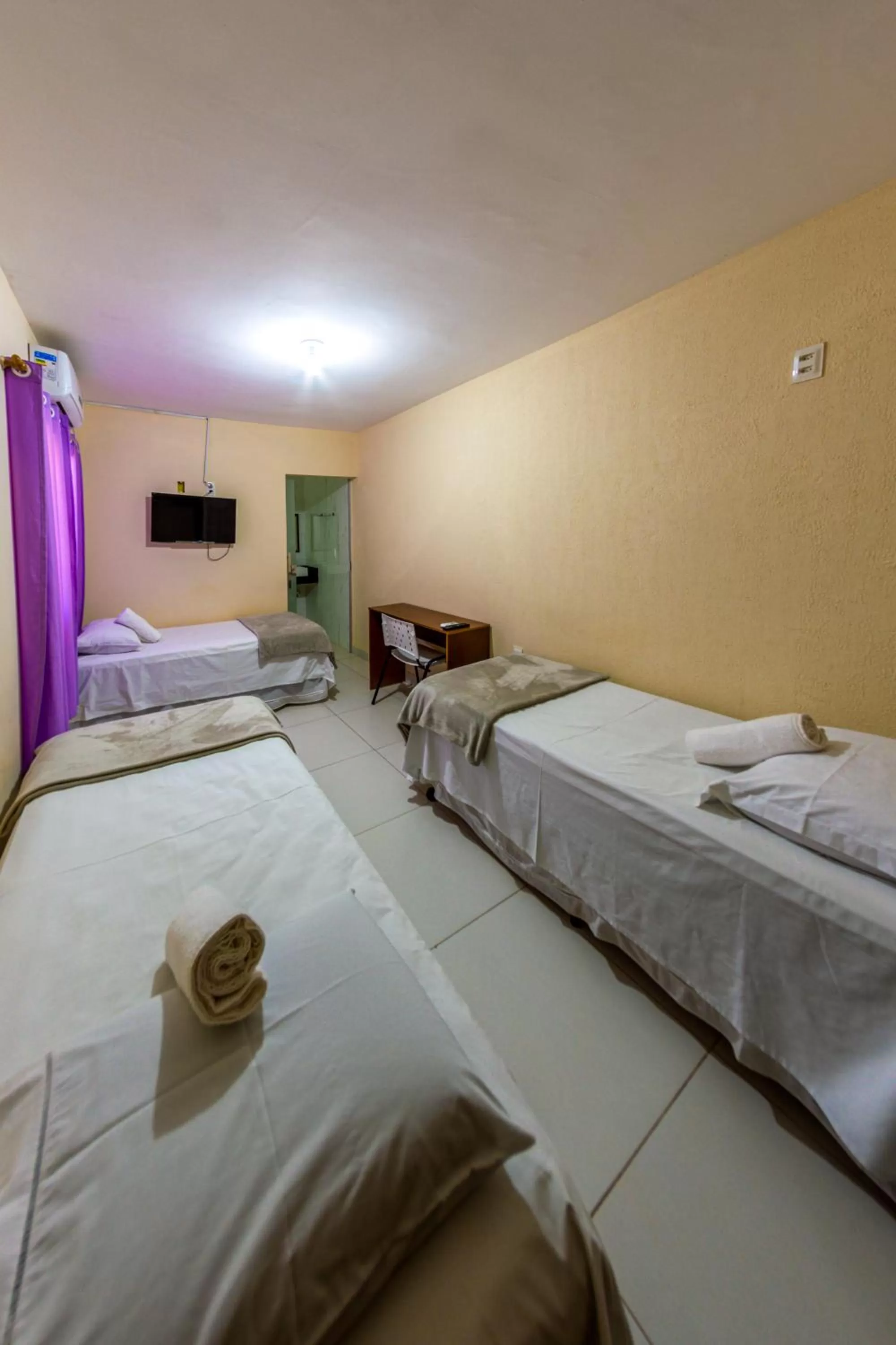 Photo of the whole room, Bed in Pousada Jardim Brasília