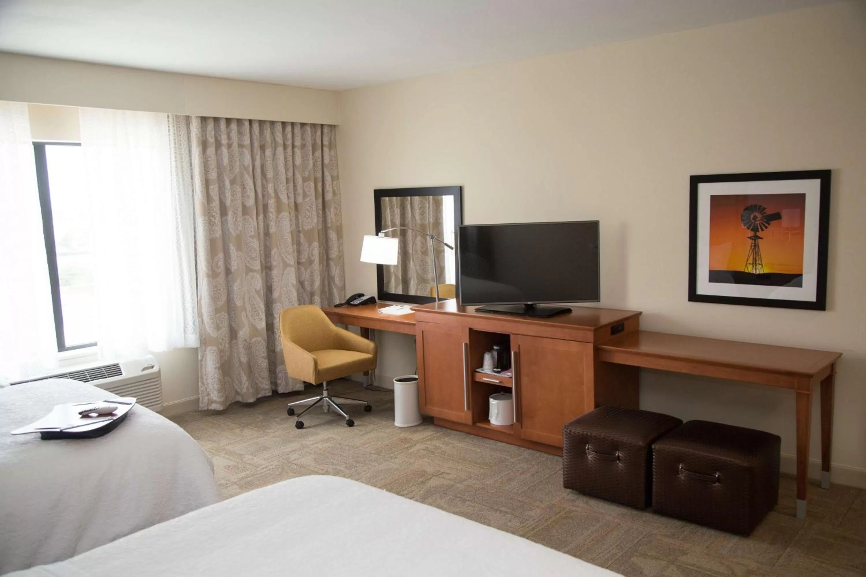 Bed in Hampton Inn and Suites by Hilton McKinney