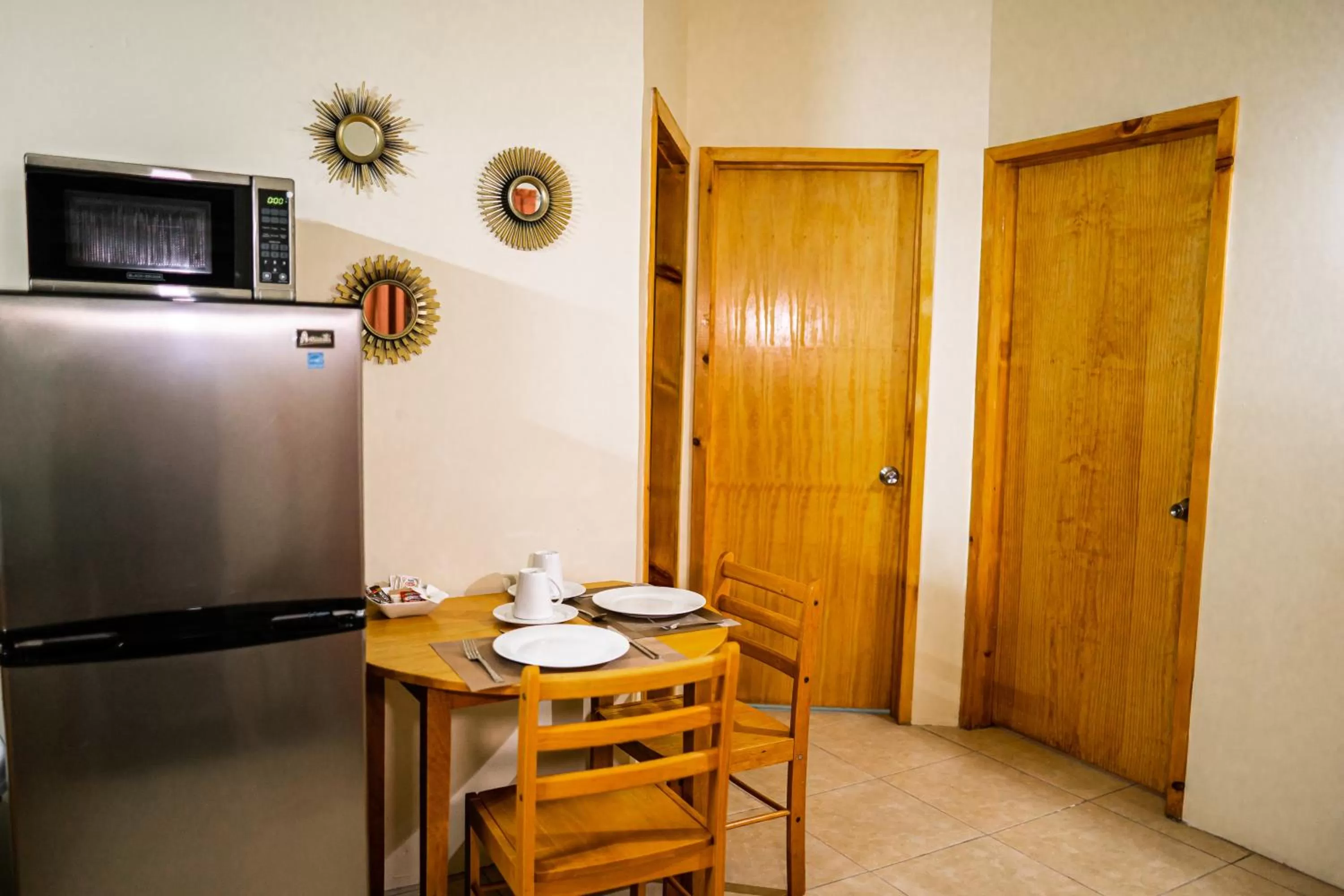 Kitchen or kitchenette in Connie's Comfort Suites