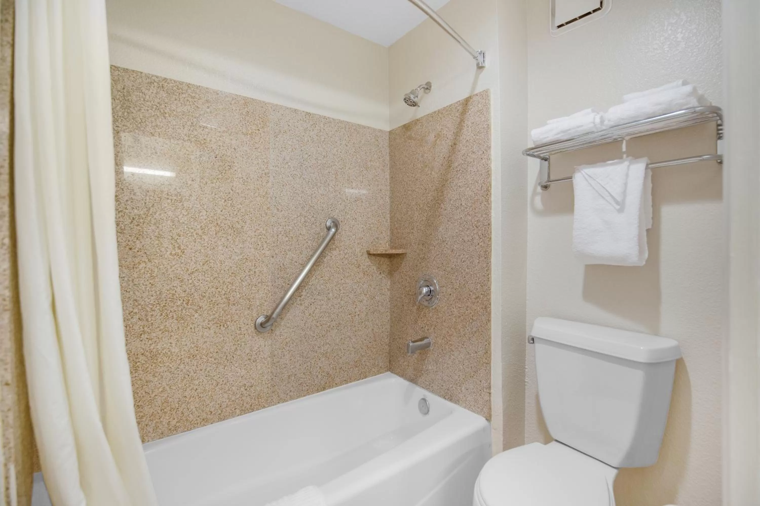 Bathroom in SureStay Hotel by Best Western Fontana