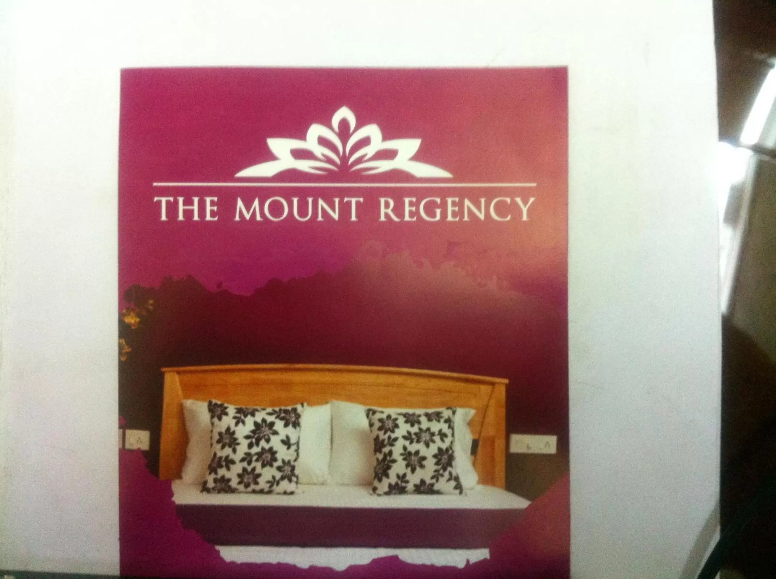 Property logo or sign in The Mount Regency