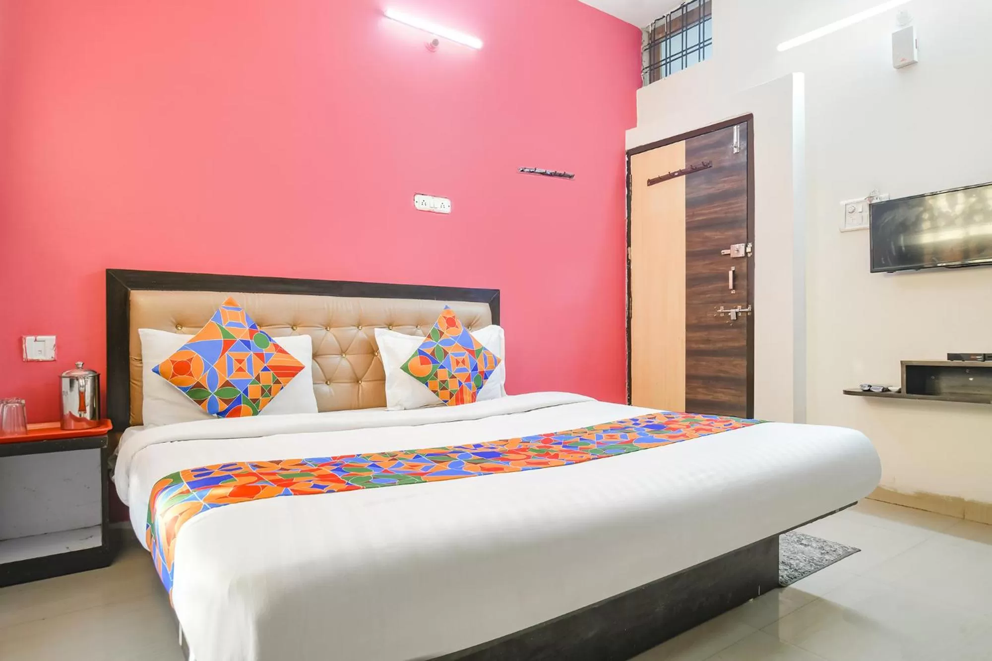 Bed in FabExpress Royal Palace Inn