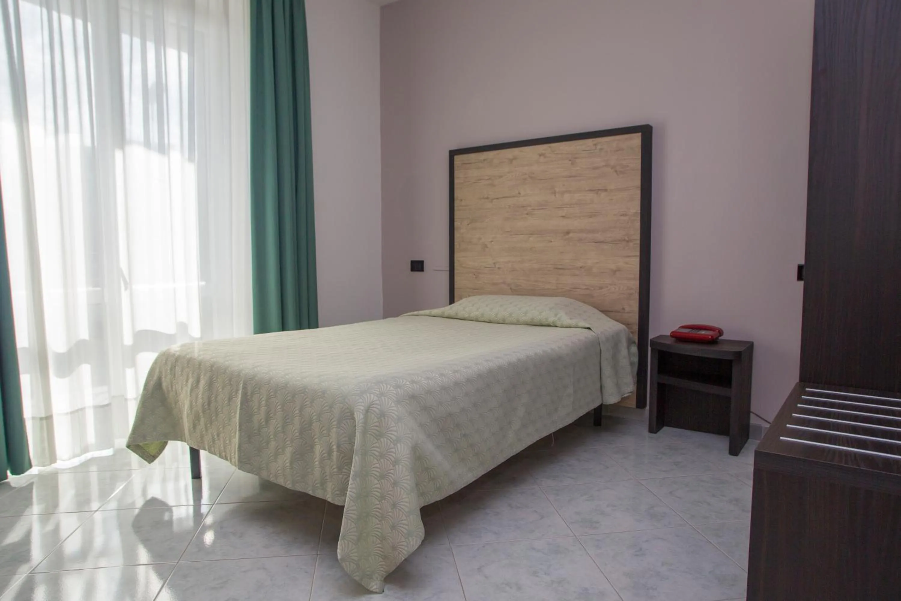 Bed in Hotel San Marco