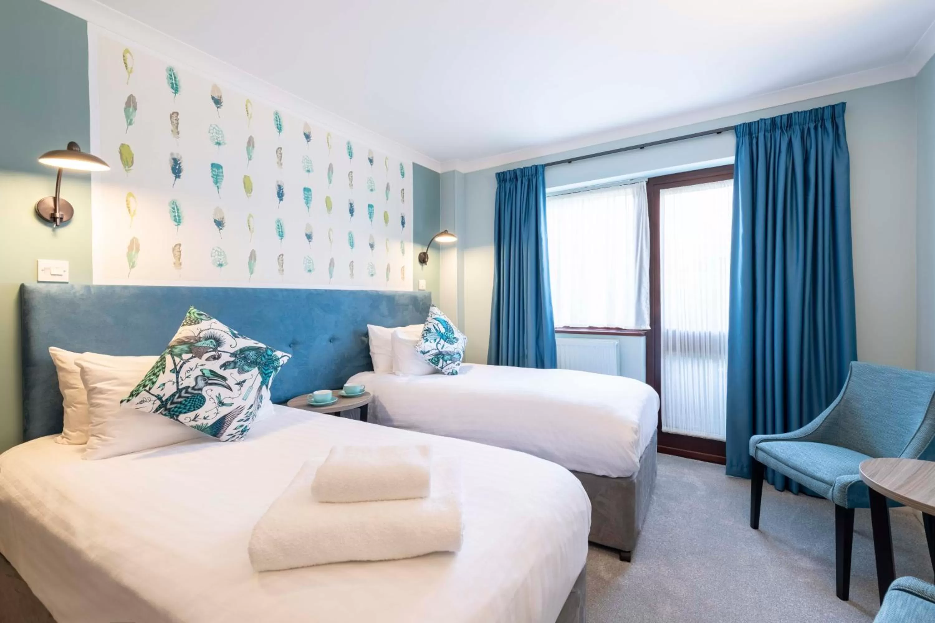 Bed in Wisteria Hotel