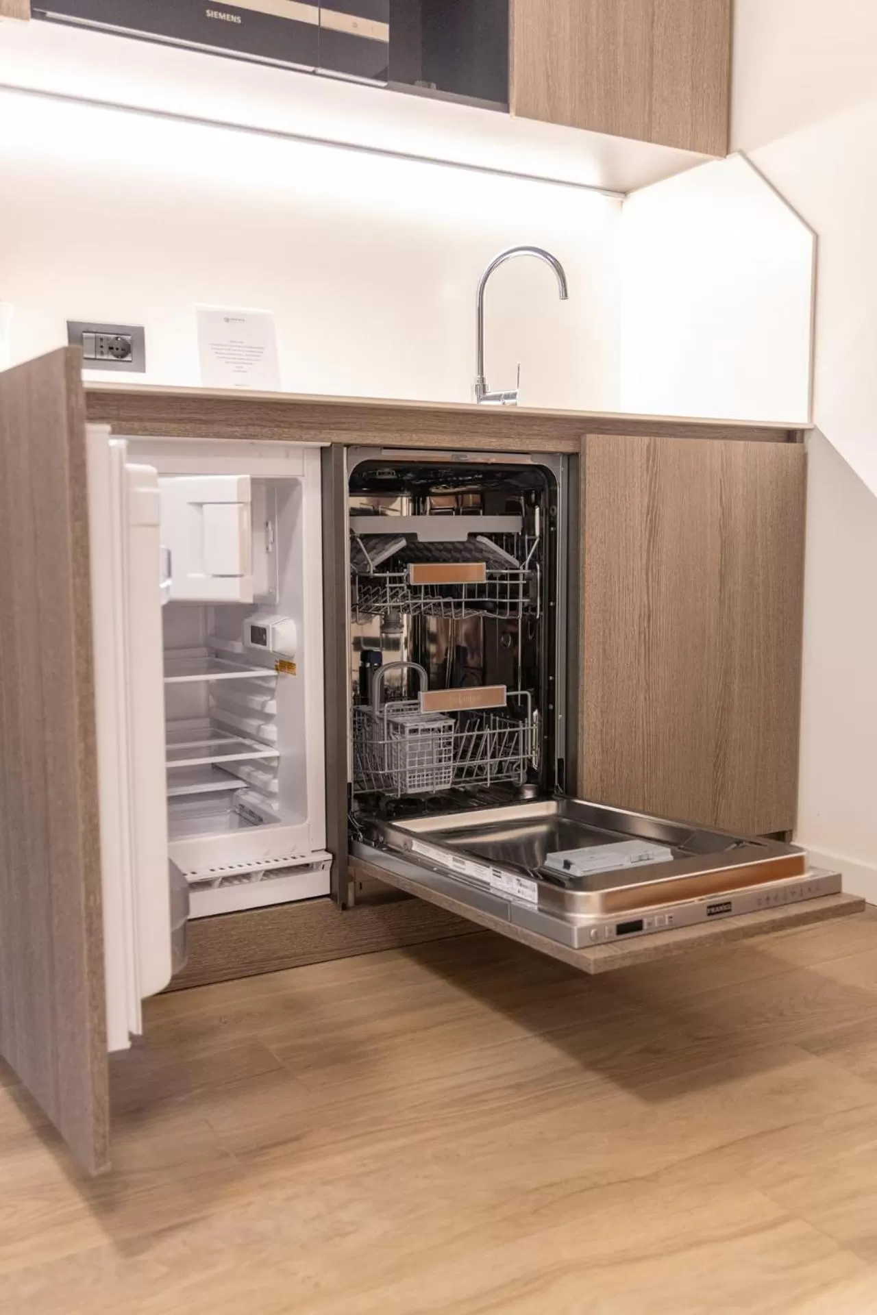 Kitchen or kitchenette in Olimpia Hotel