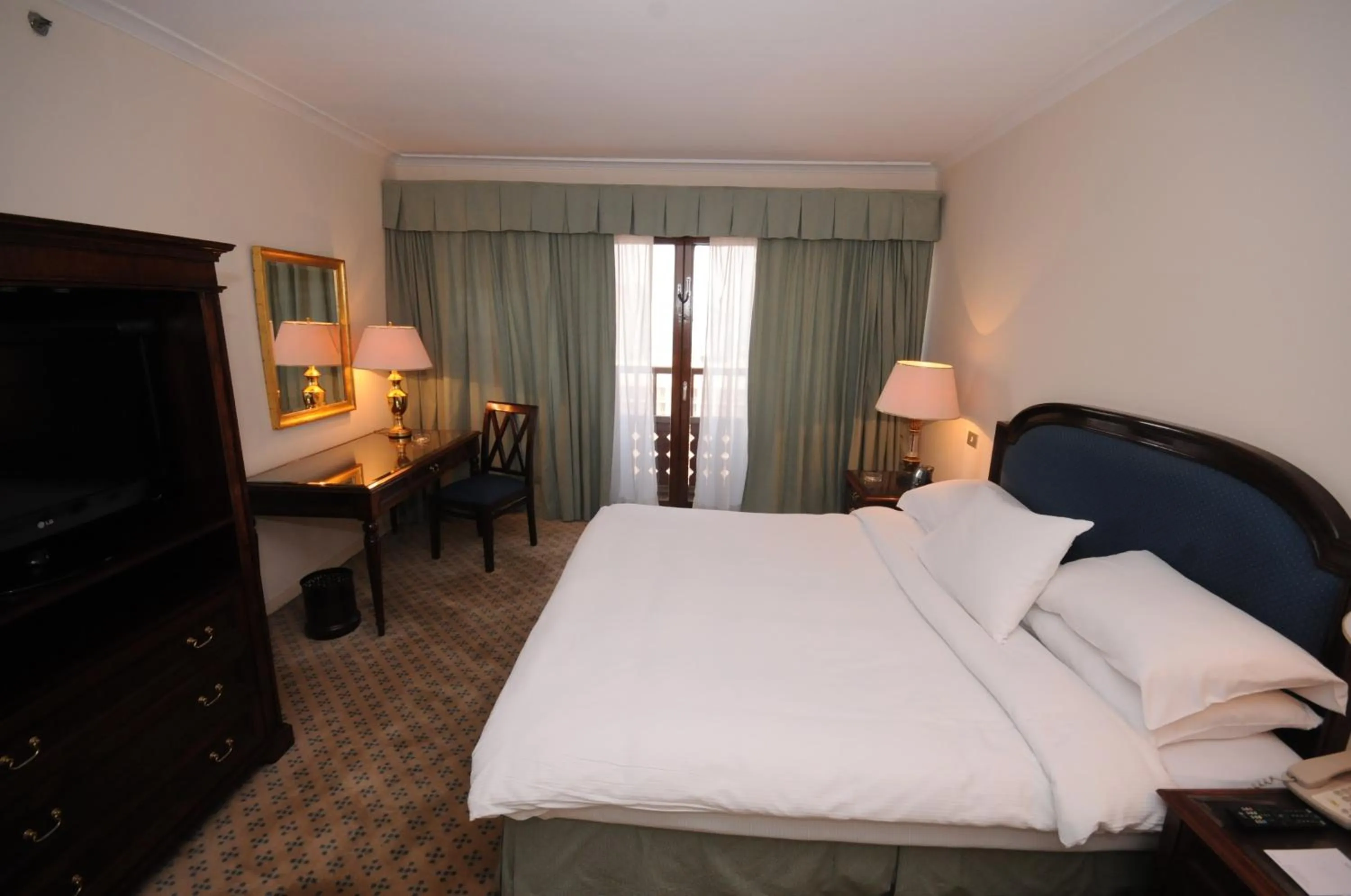 Bed in Cairo World Trade Center Hotel & Residences