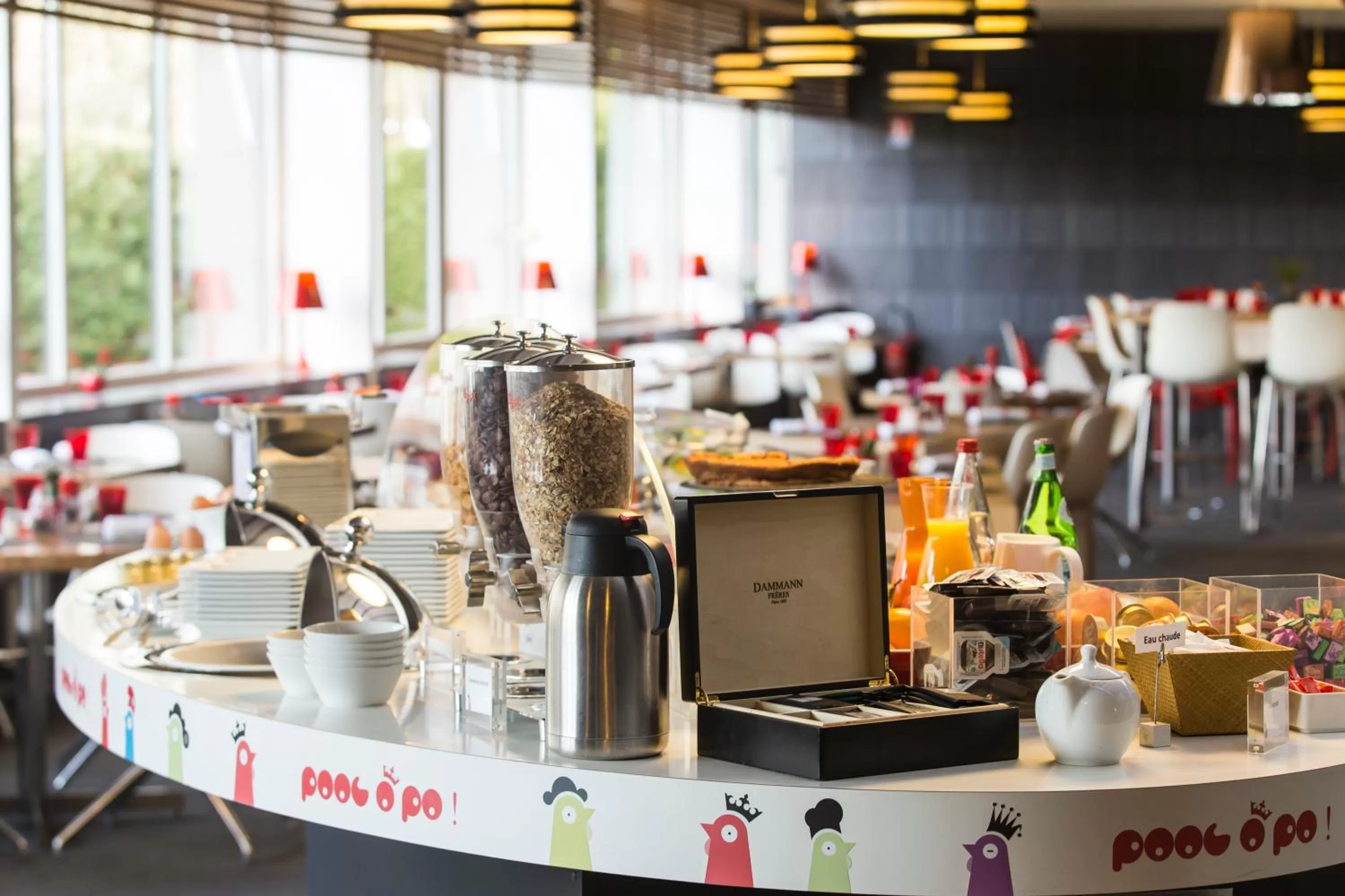 Dining area in Kyriad Montchanin le Creusot