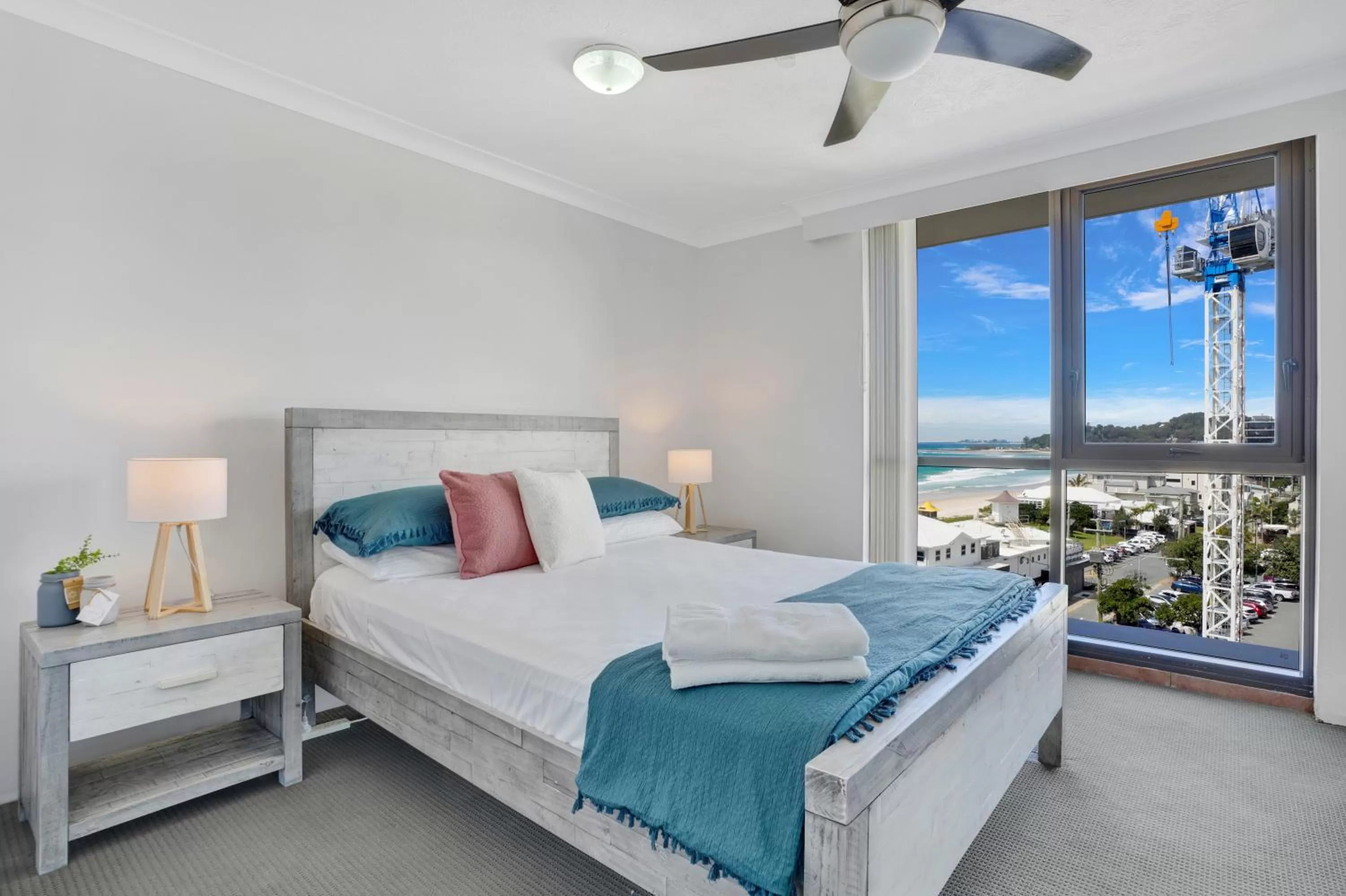 Bed in Beach Palms Holiday Apartments