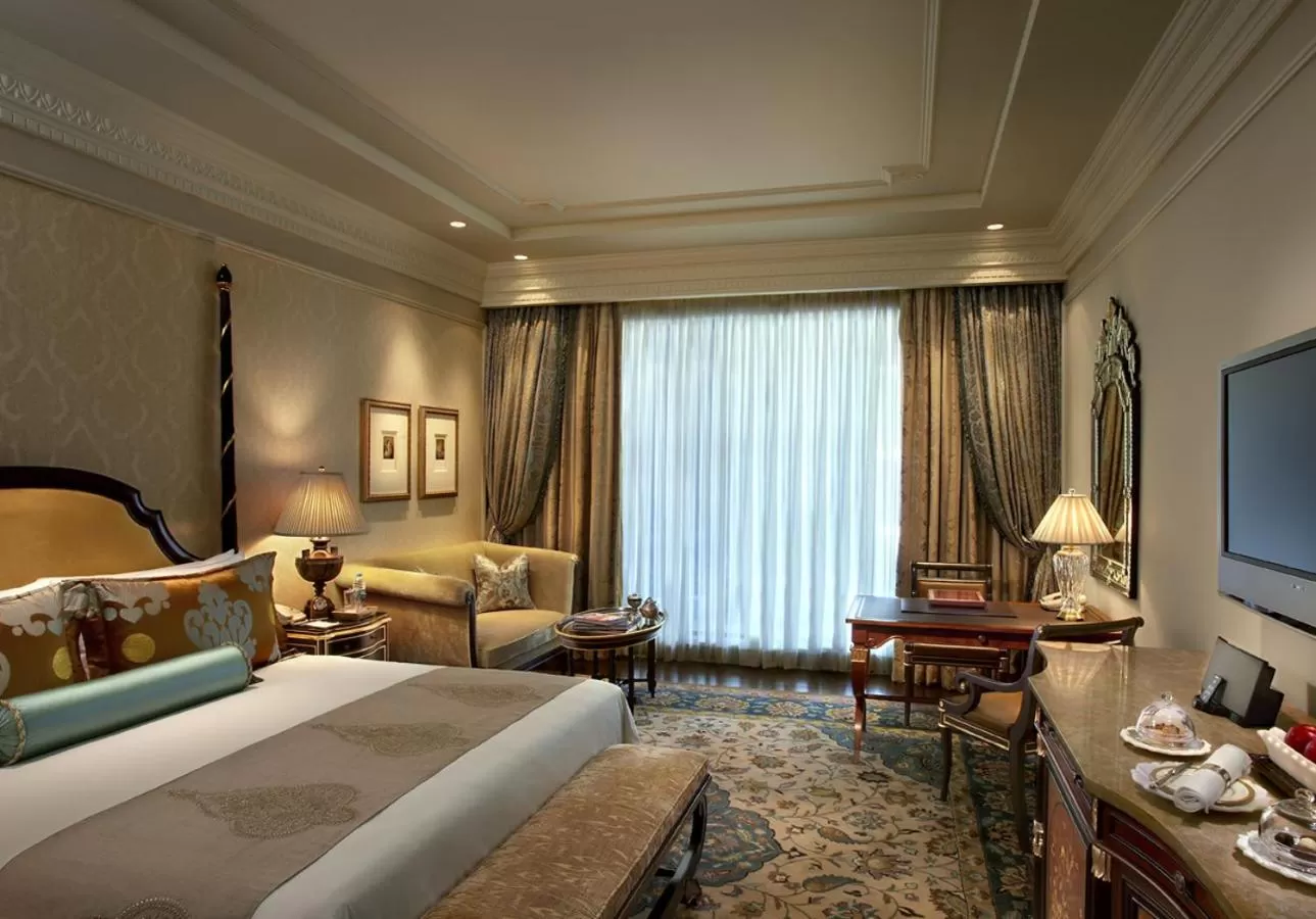 Photo of the whole room, Bed in The Leela Palace New Delhi