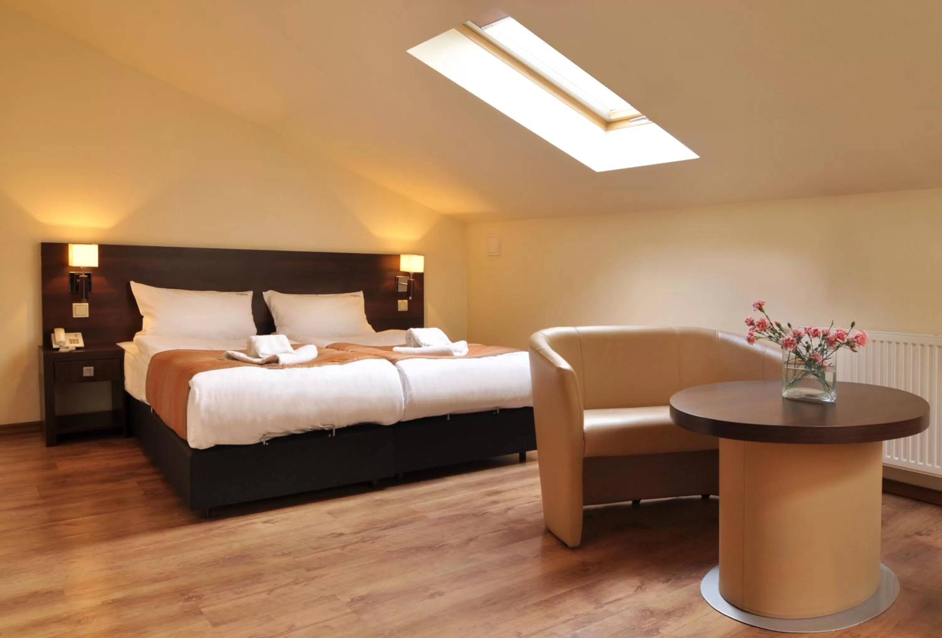 Bed in Spatz Aparthotel