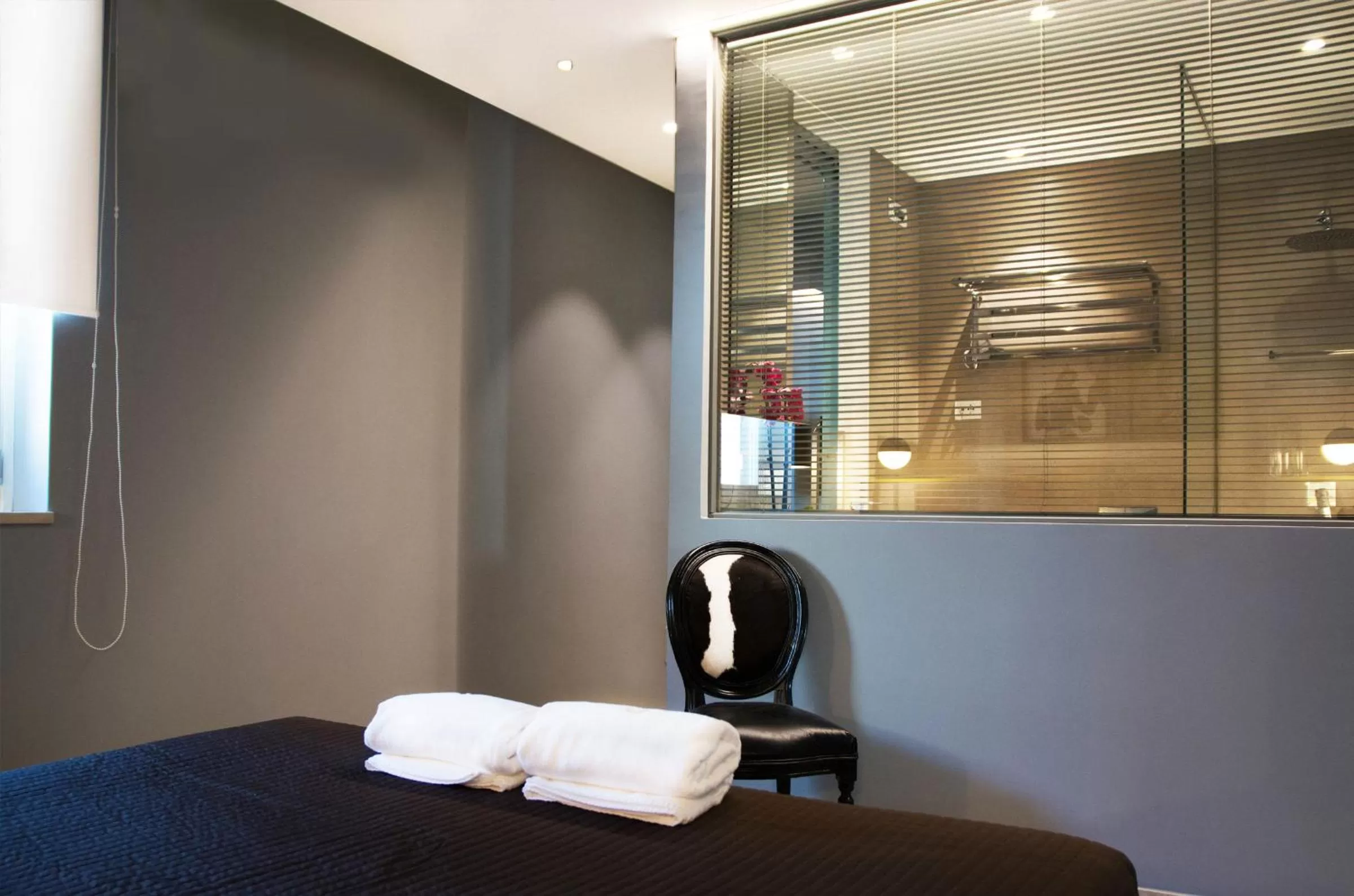 Bed in CinqueSuites Ortigia