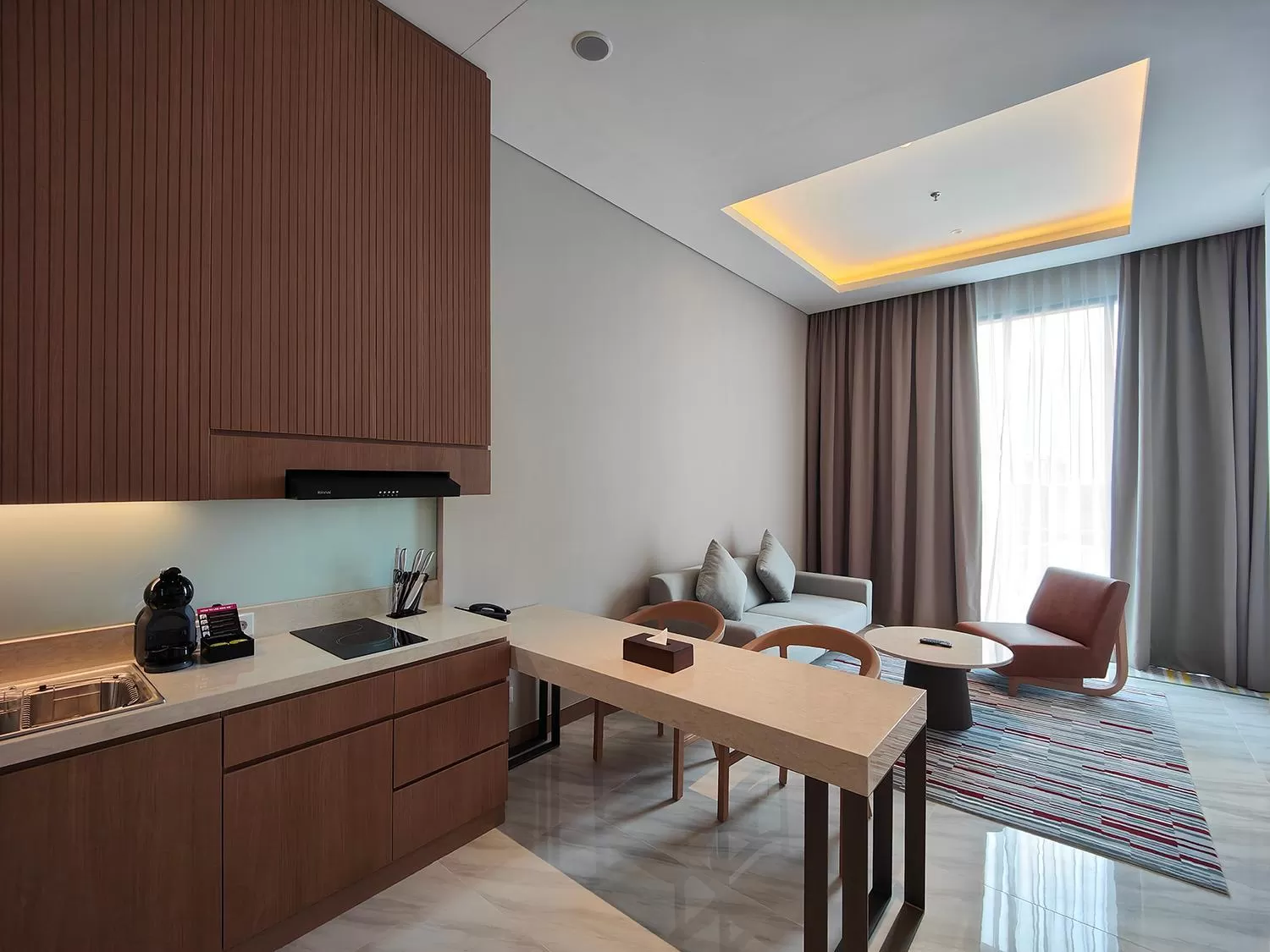 Kitchen or kitchenette in Ra Suites Simatupang