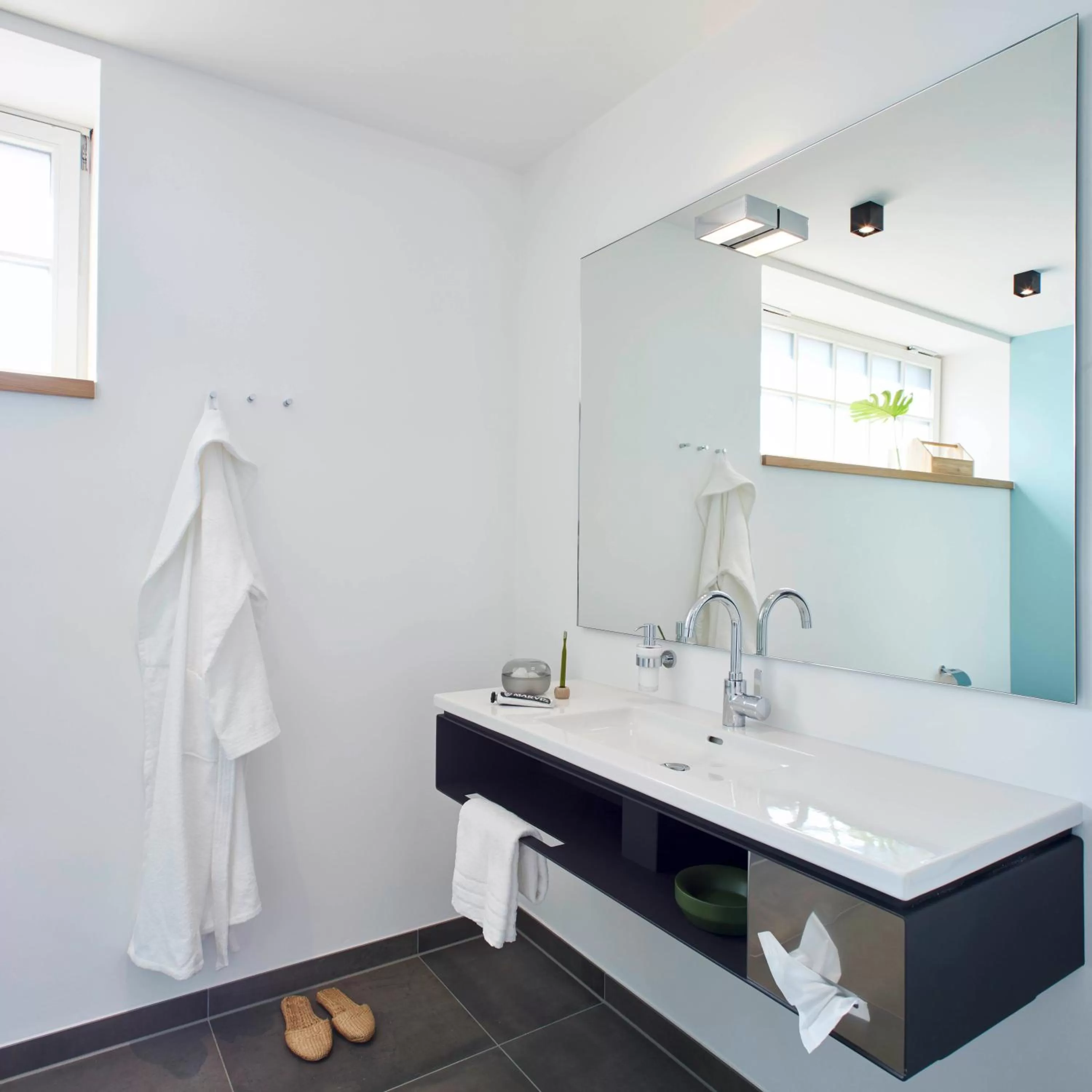 Bathroom in meinwolfsburg hotel auf dem rittergut vormals Yard Boarding Hotel