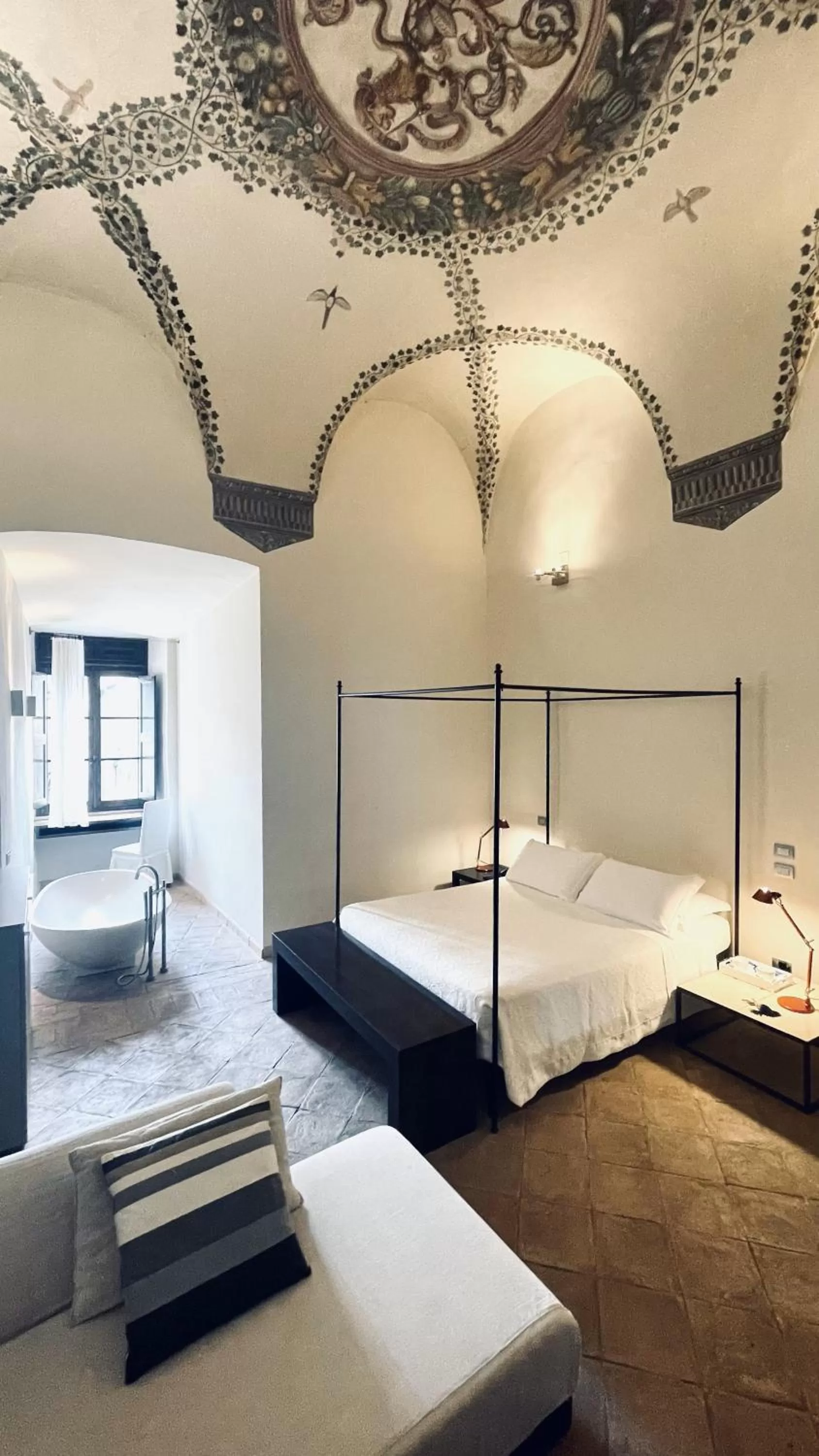 Bed in Hotel Palazzo Piccolomini