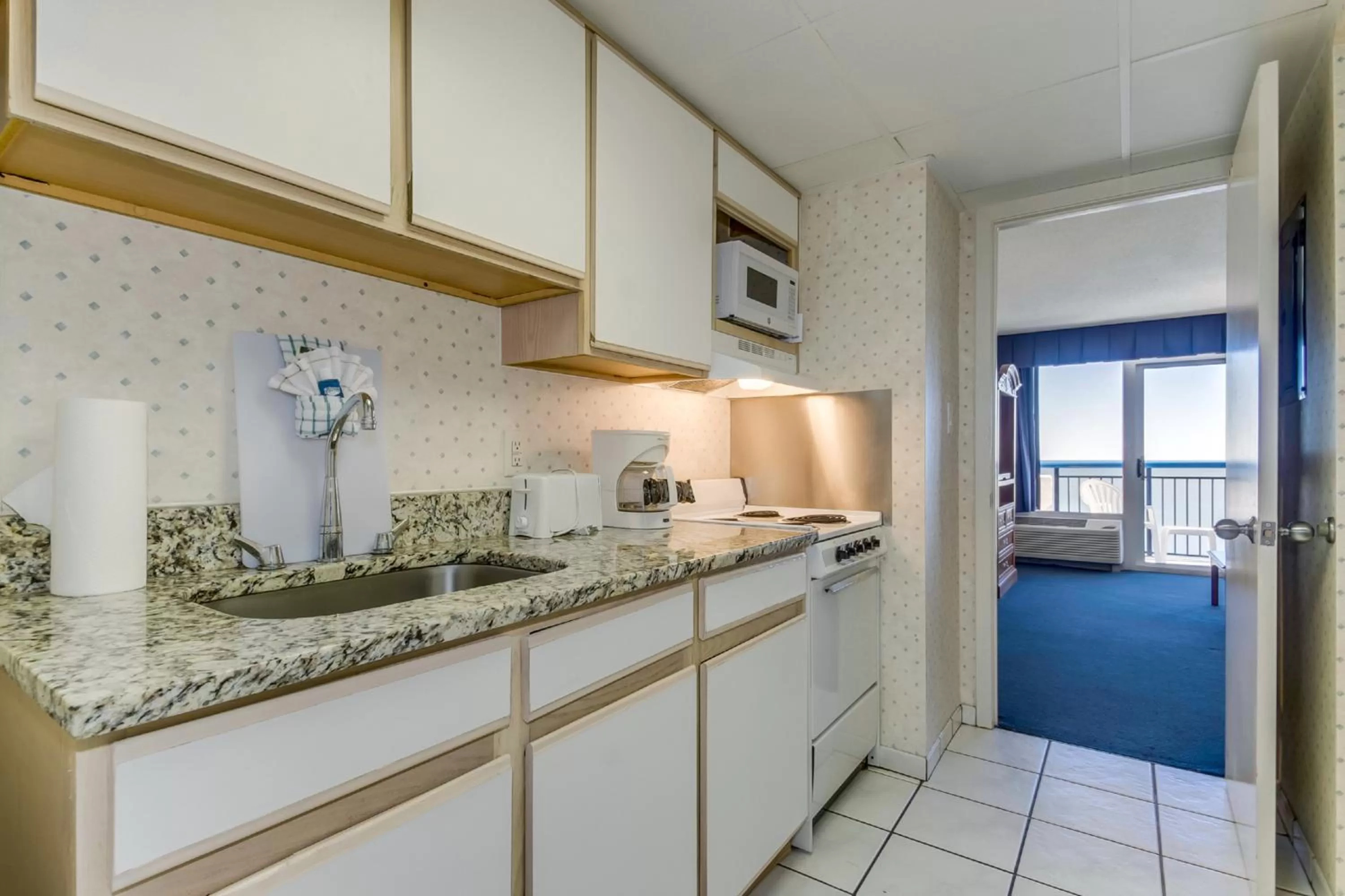 Kitchen or kitchenette in Boardwalk Beach Resort Condo w Oceanfront Balcony