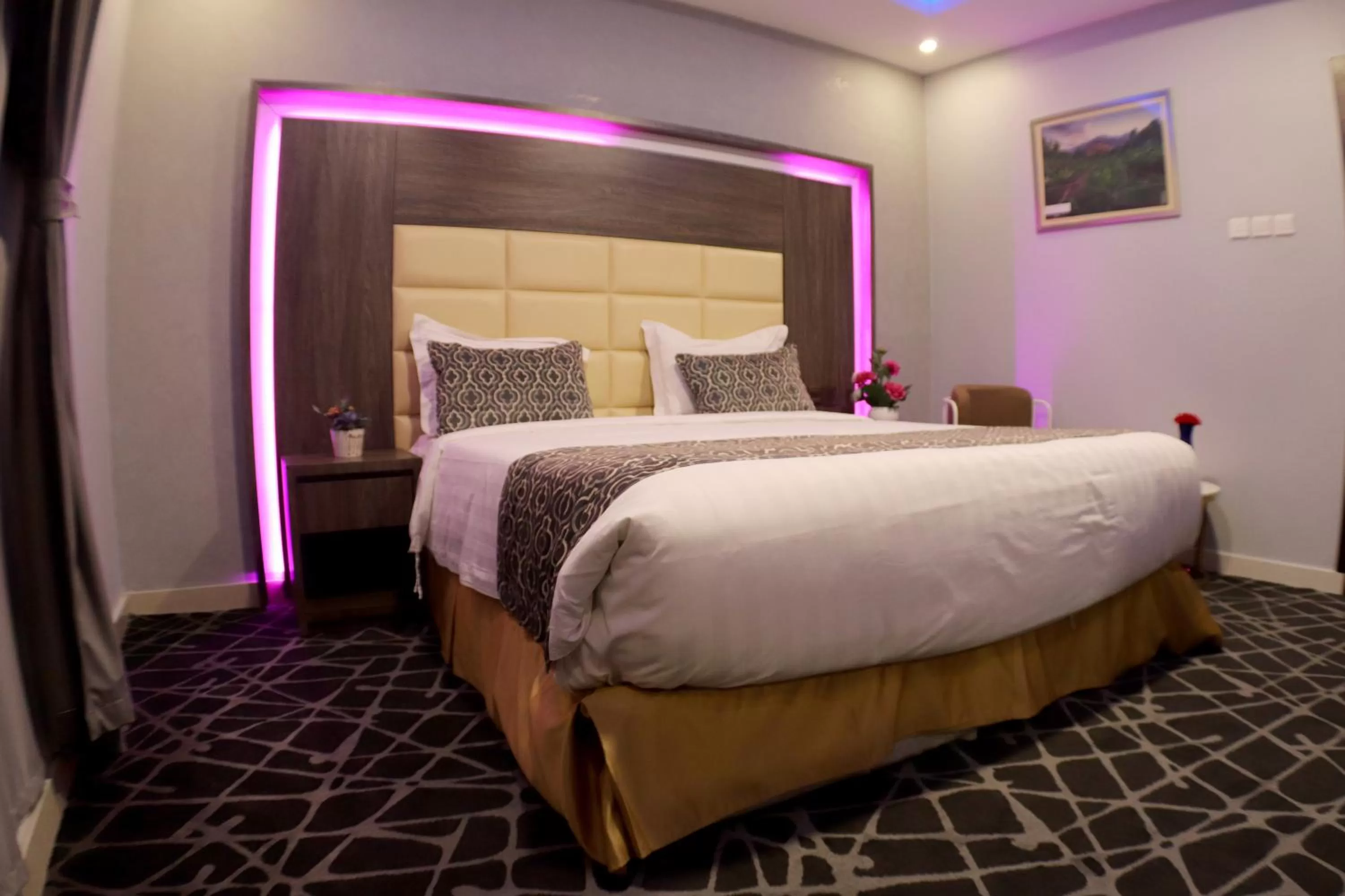Bed in Maskan Al Dyafah Hotel Apartments
