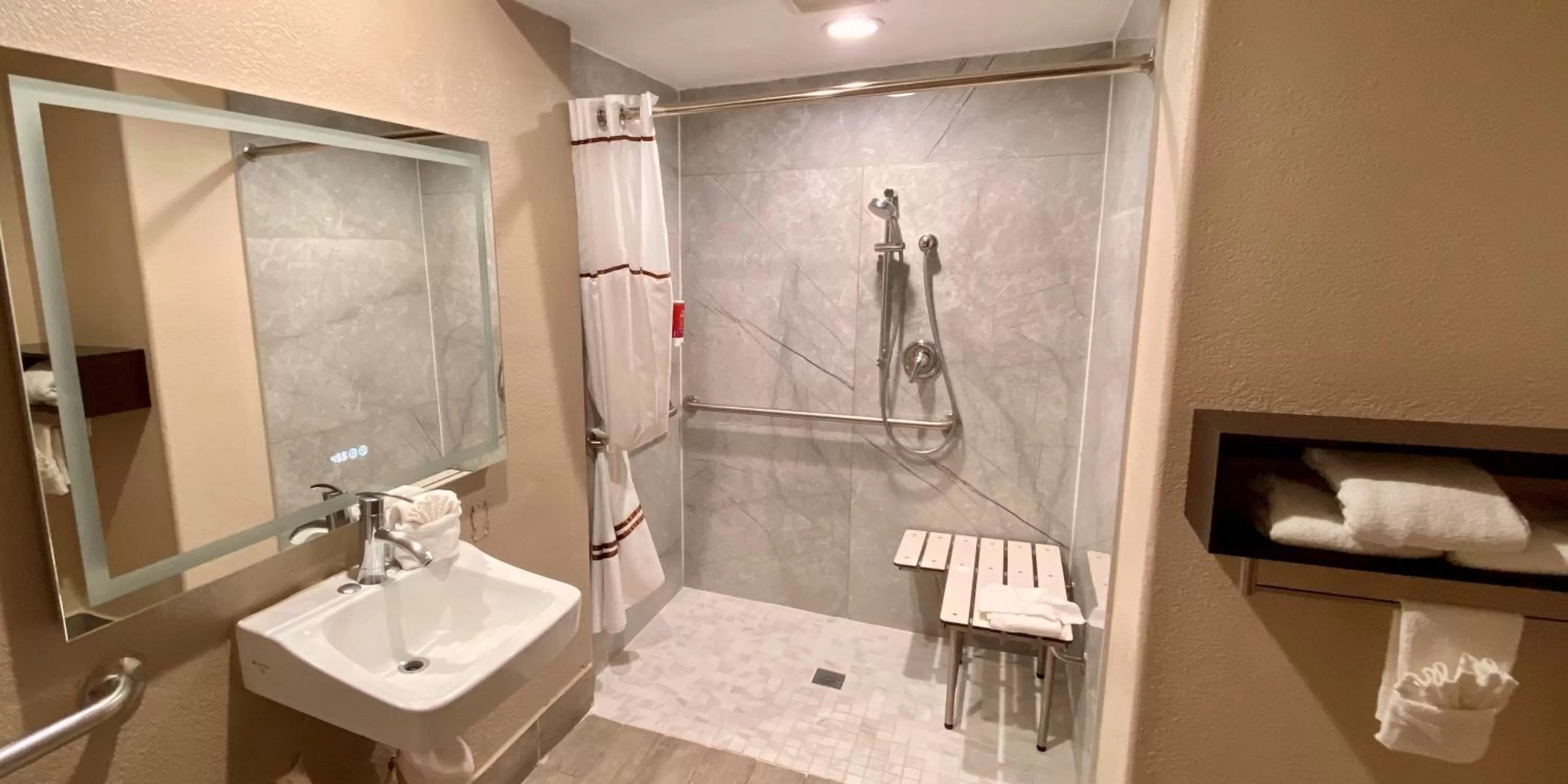 Bathroom in SureStay Hotel by Best Western Santa Cruz