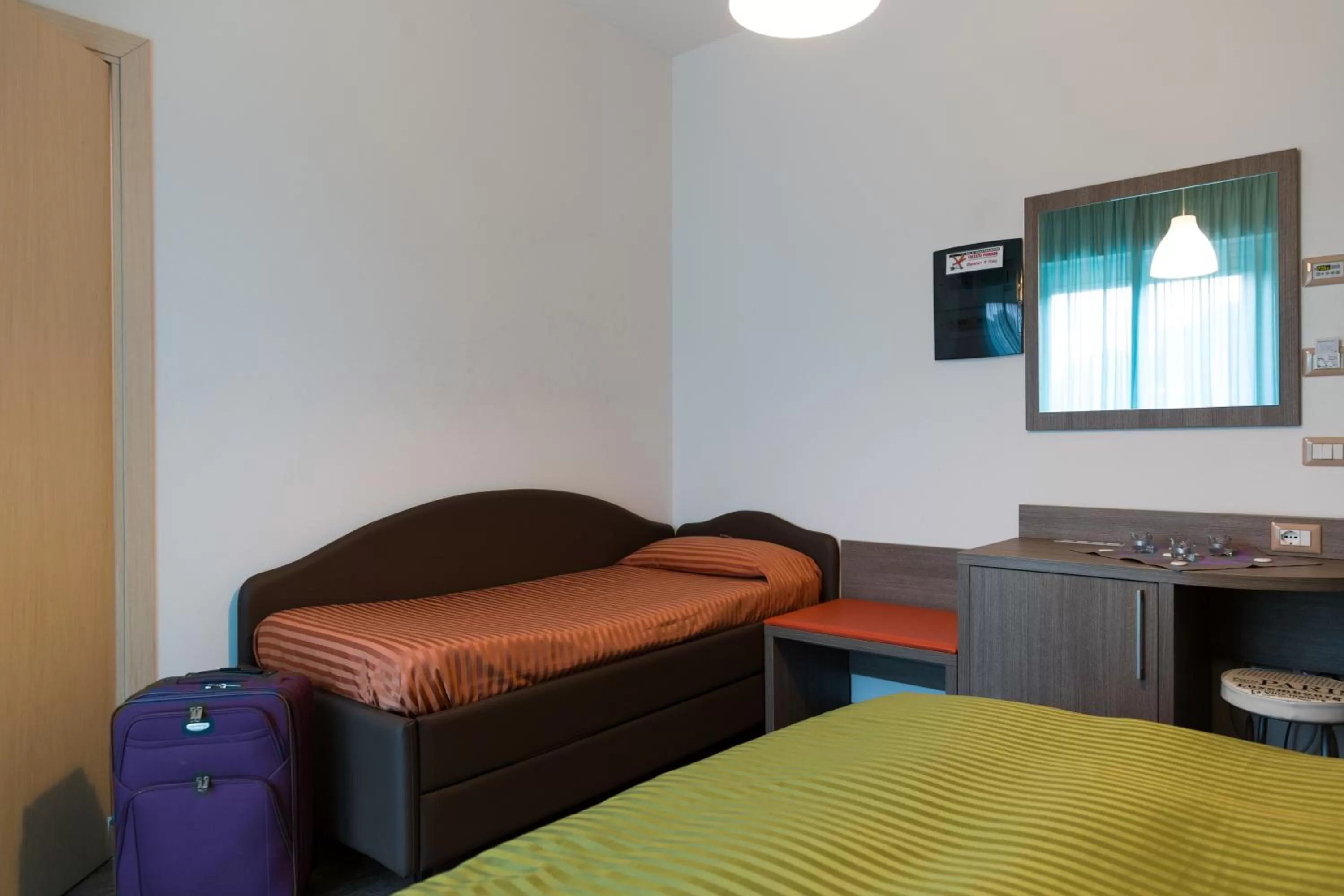 Bed in Hotel Miramare