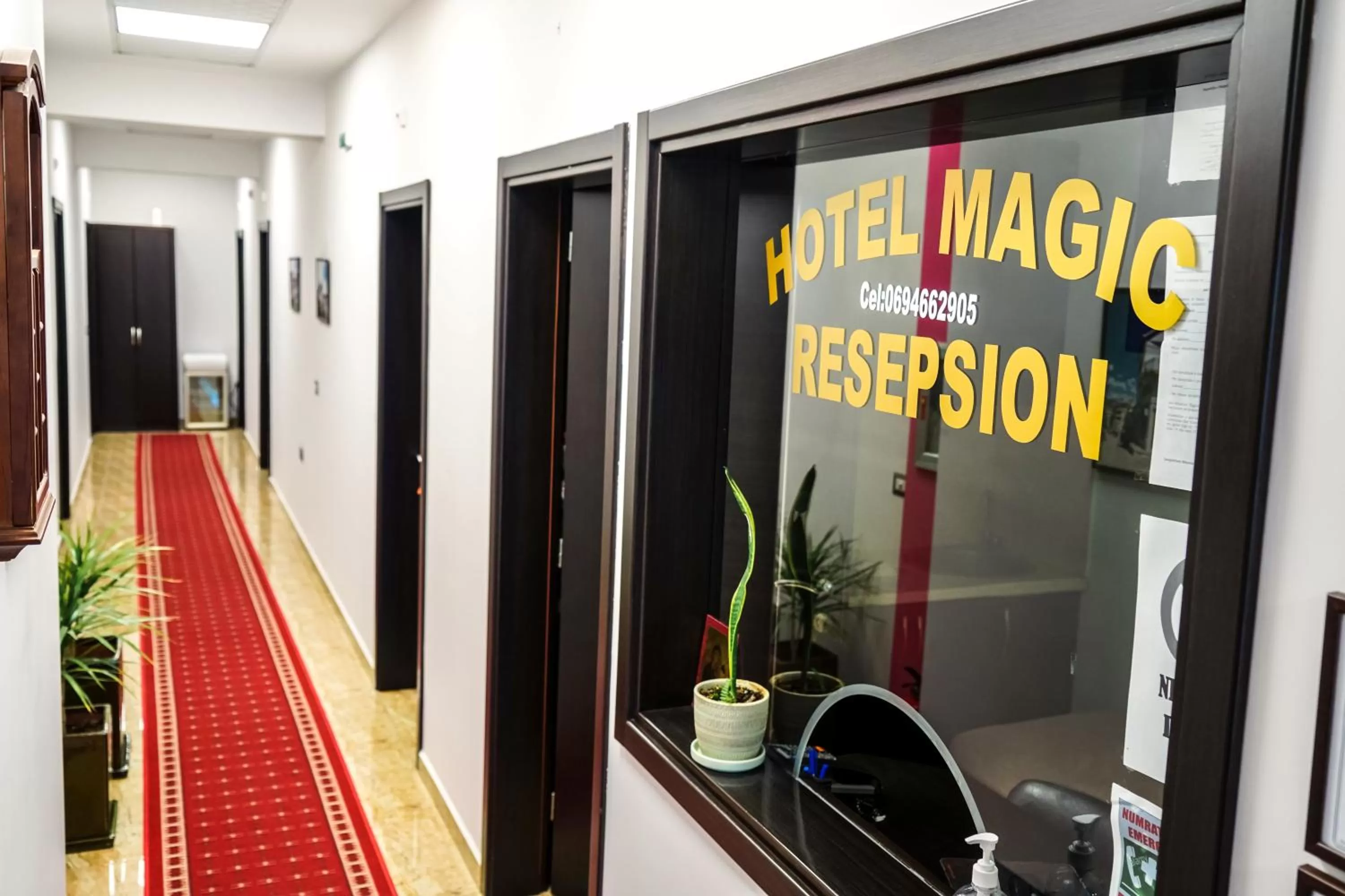 Property logo or sign in Hotel Magic