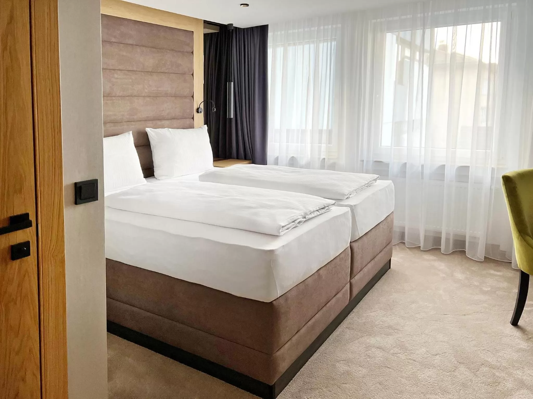 Photo of the whole room, Bed in DORMERO Hotel Reutlingen