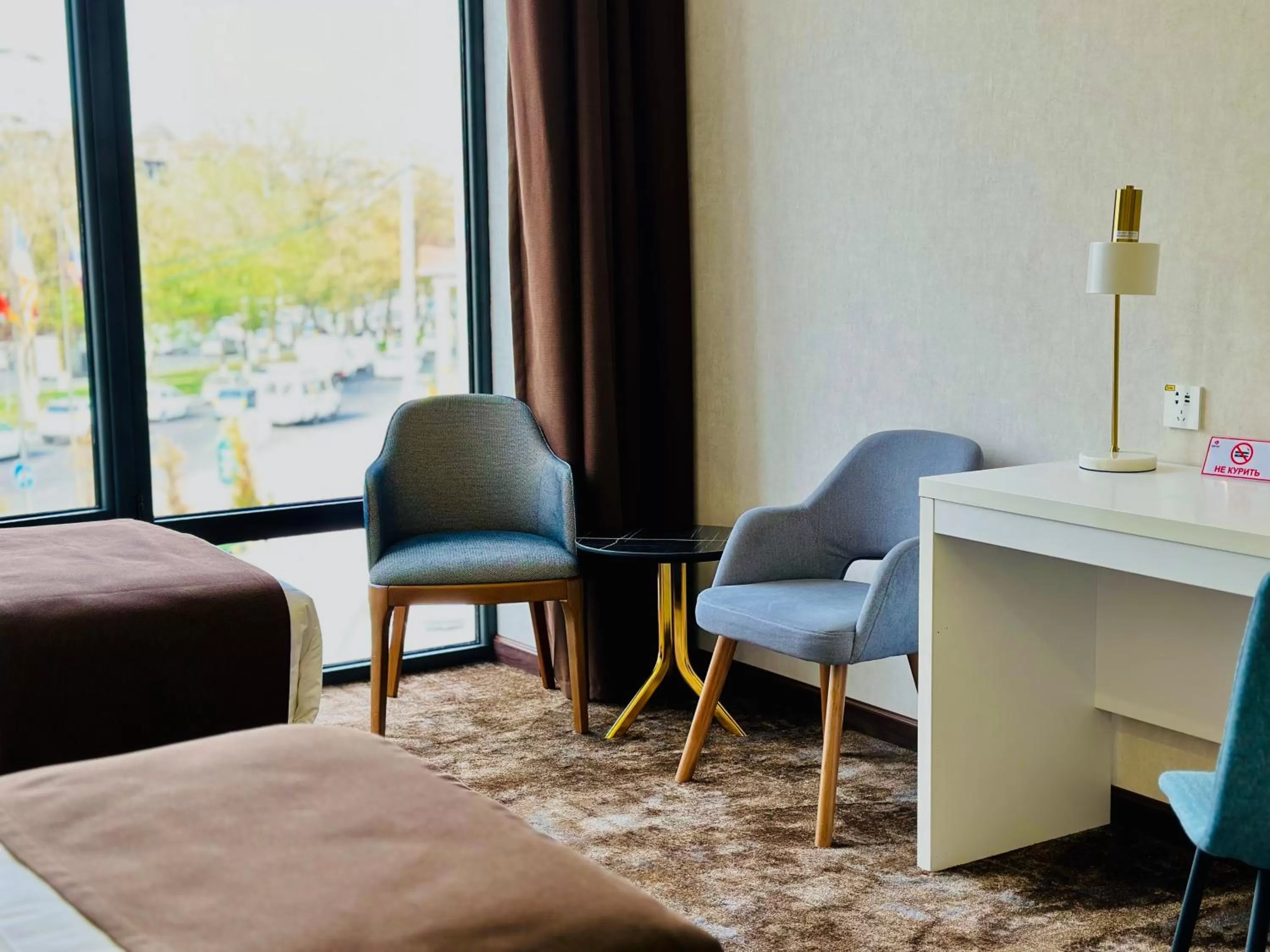 Seating area, Bed in Garnet Hotel Tashkent