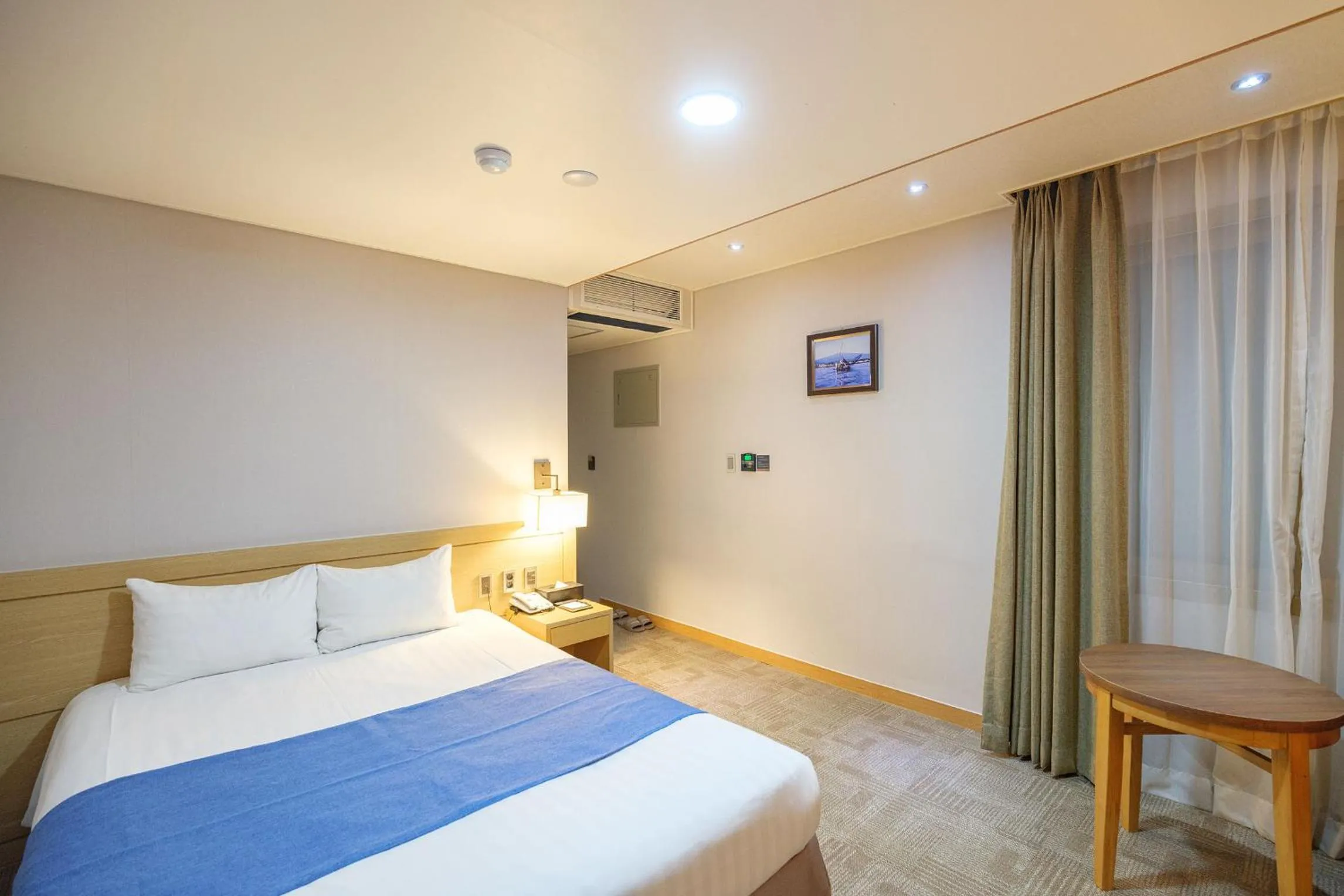 Decorative detail, Bed in Benikea Hotel Jeju