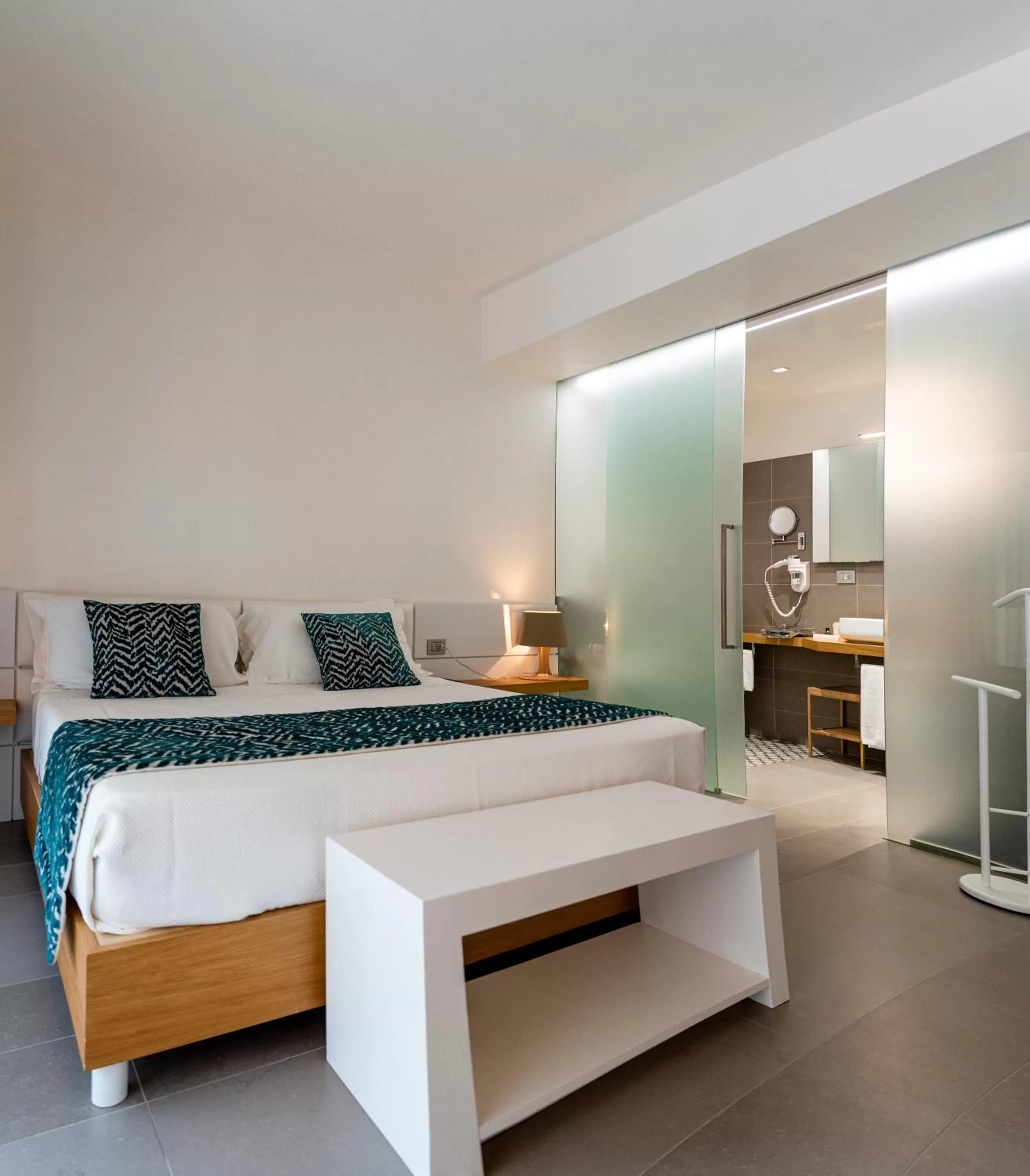 Photo of the whole room, Bed in Caportigia Boutique Hotel