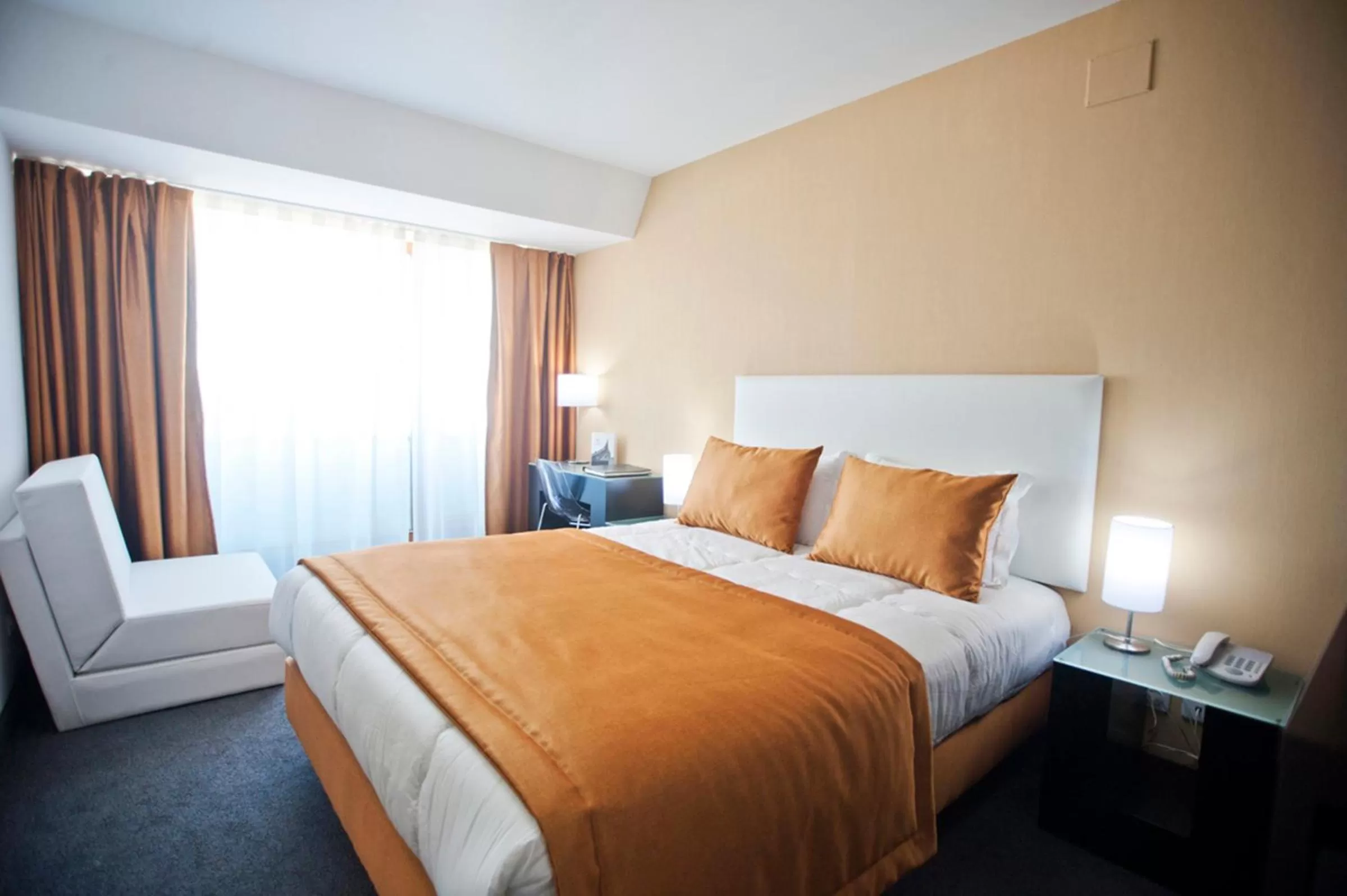 Bed in Miramar Hotel Spa & Apartments