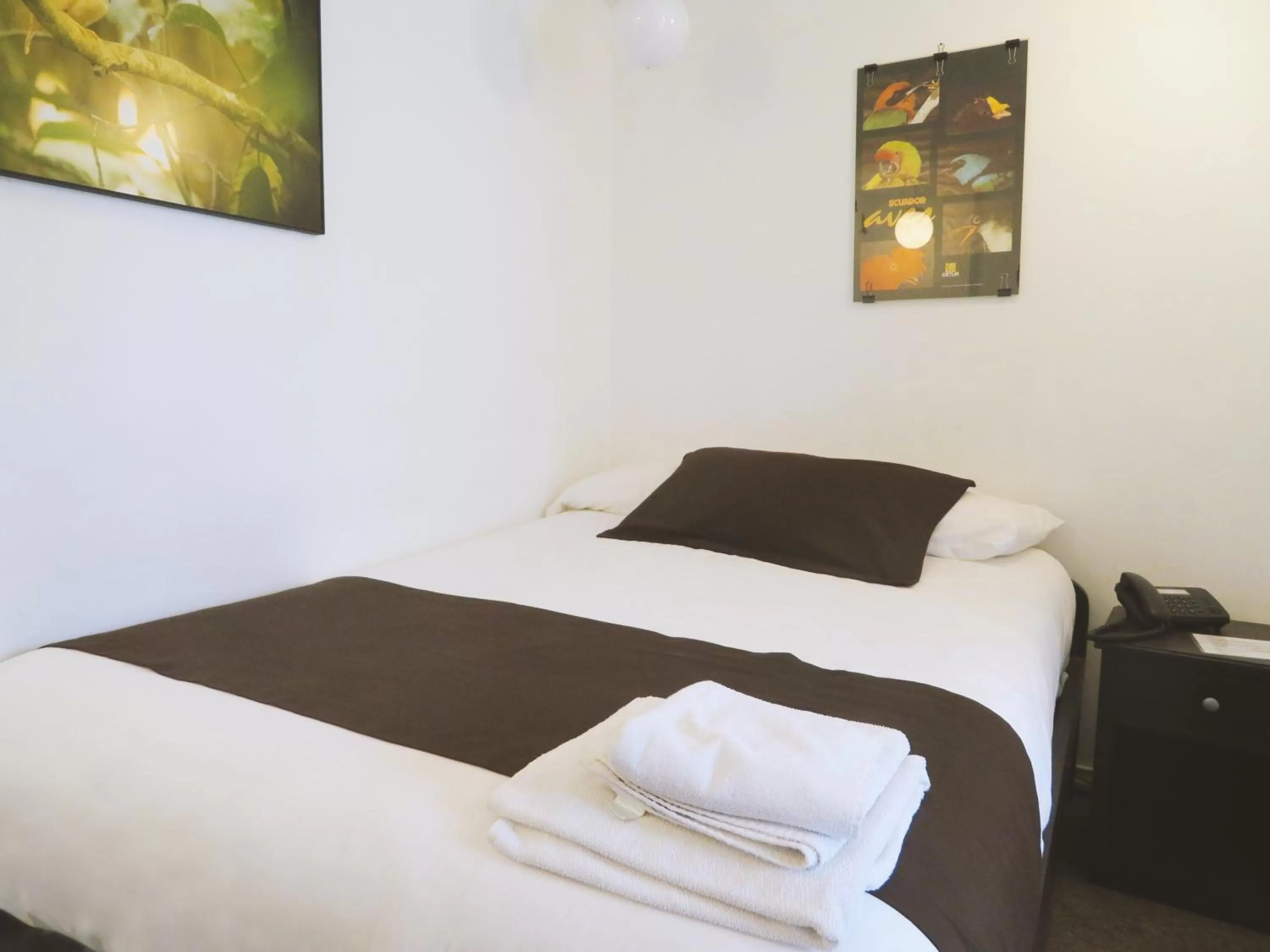 Bed in Bird Garden Guest House