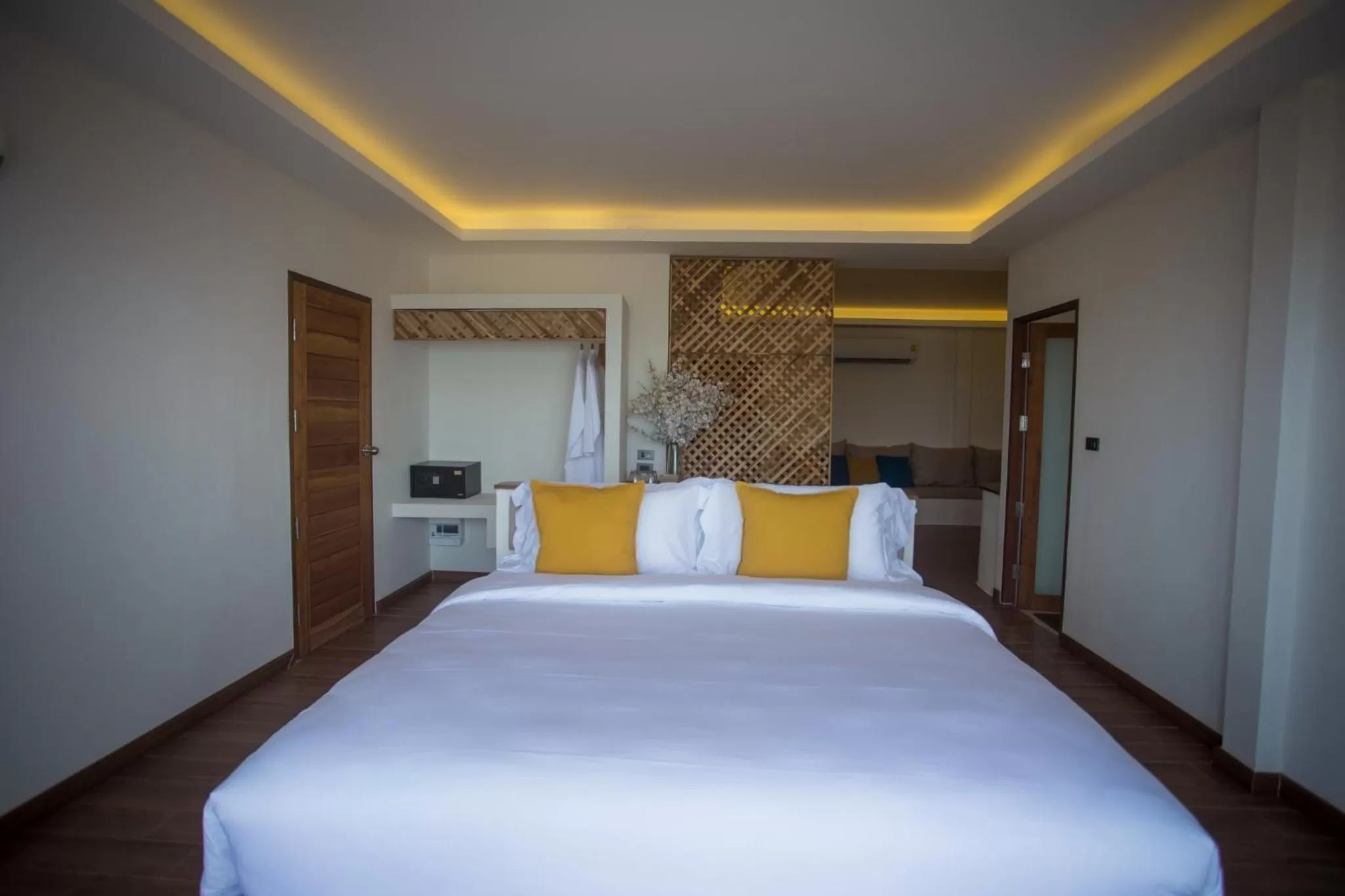 Bed in The Nest Private Beach Resort