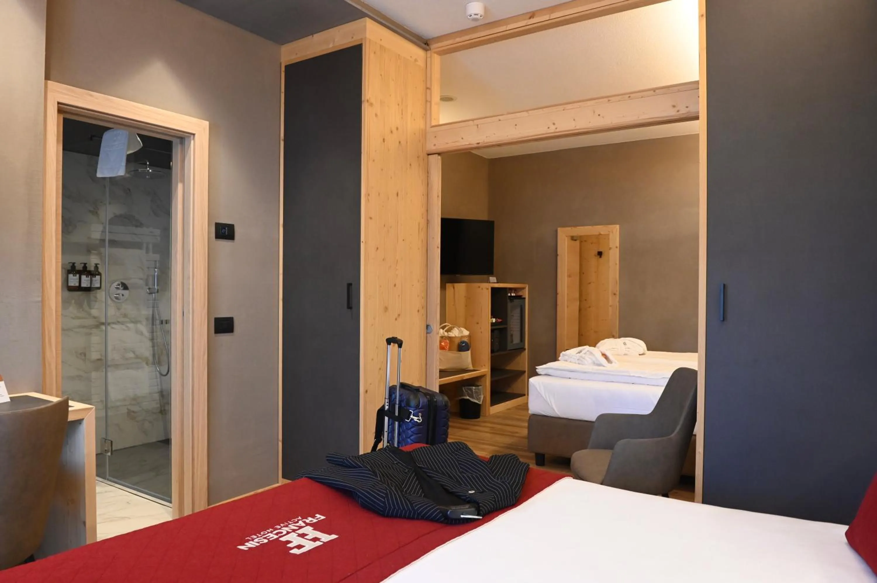 Bed in Francesin Active Hotel