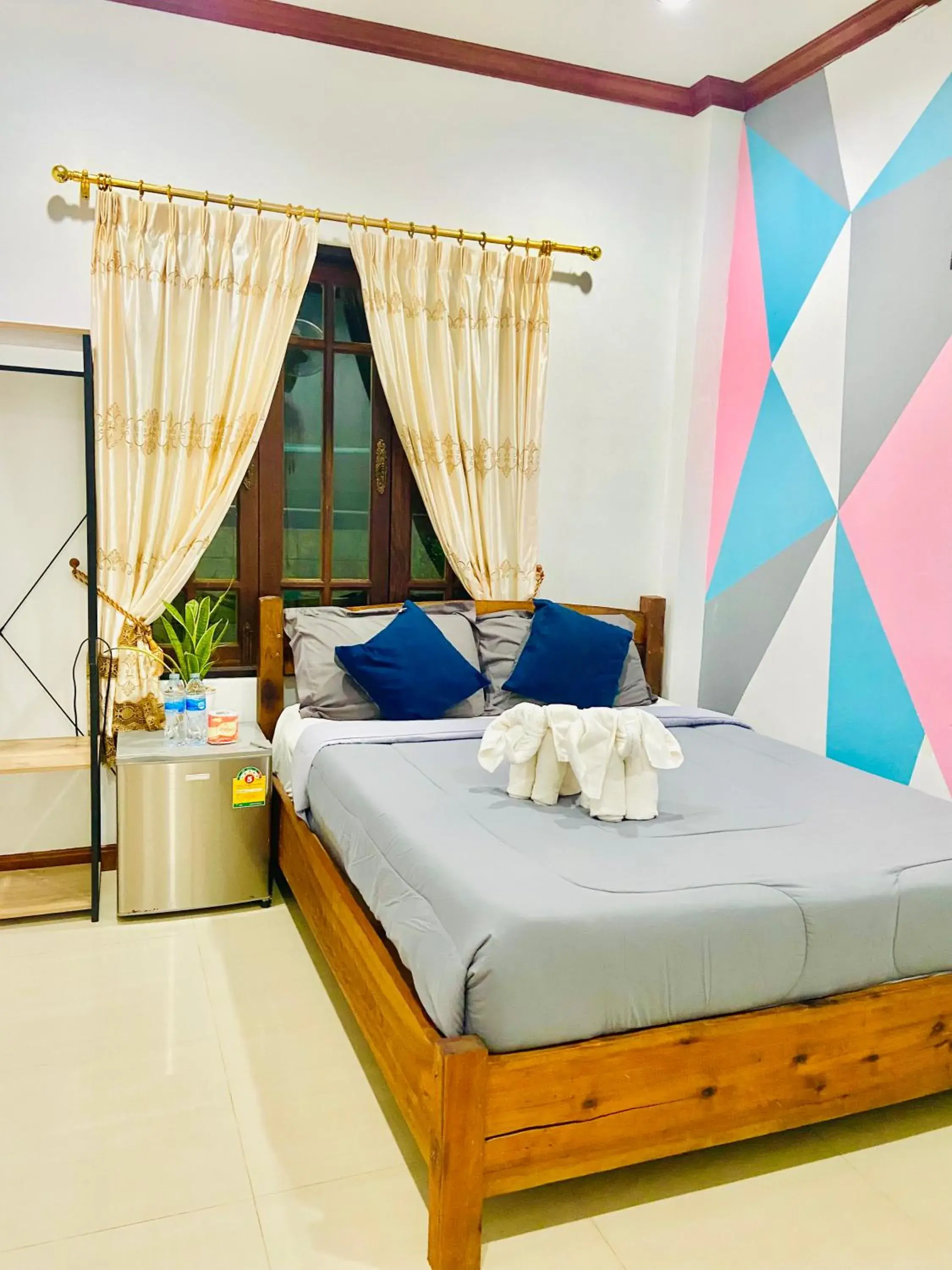 Budget Double Room with Fan (No Hot Water) in Lanta Grand House Budget Double Room with Fan (No Hot Water) in Lanta Grand House