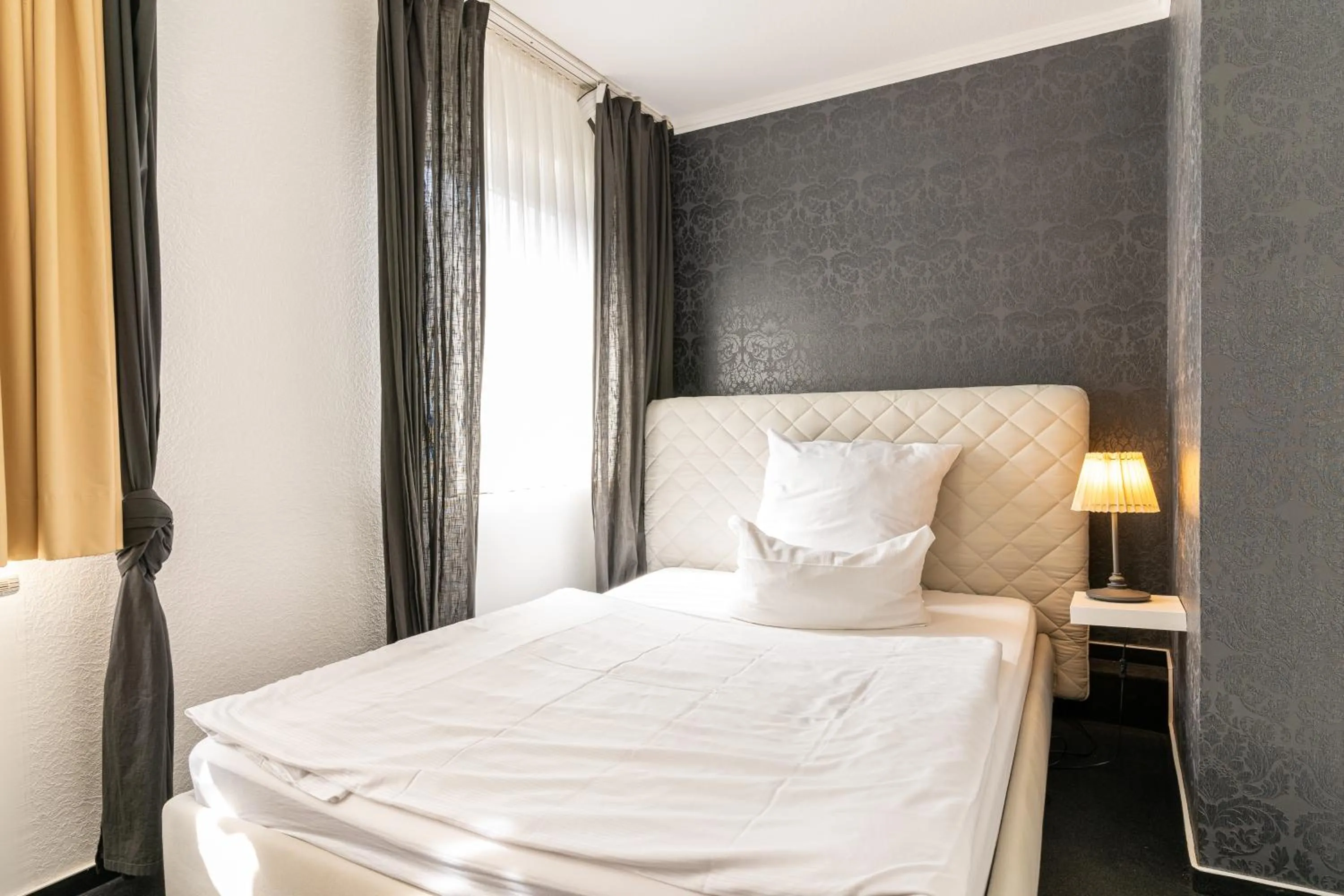 Bed in Schäfers Hotel