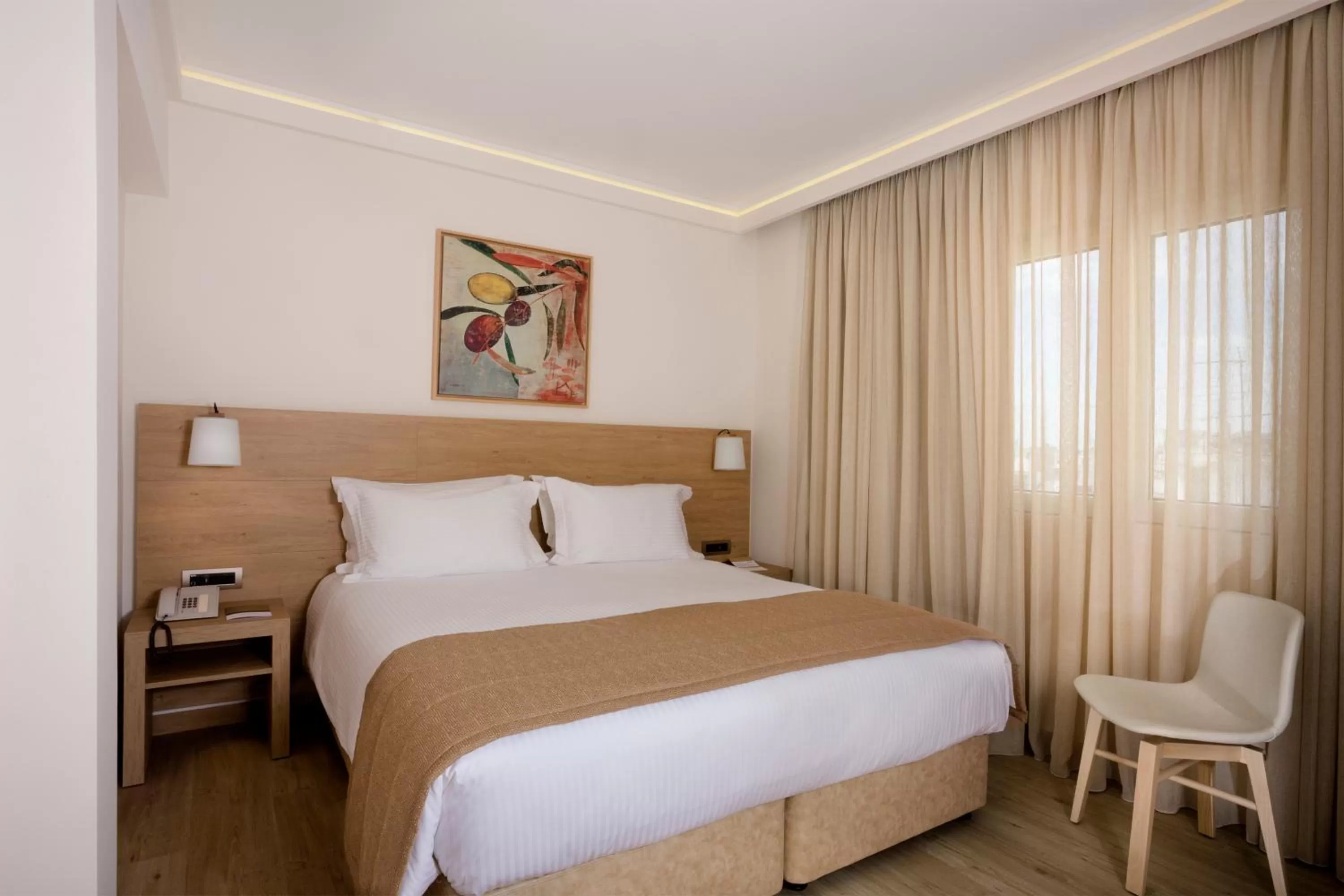 Bed in Golden Age Athens Hotel